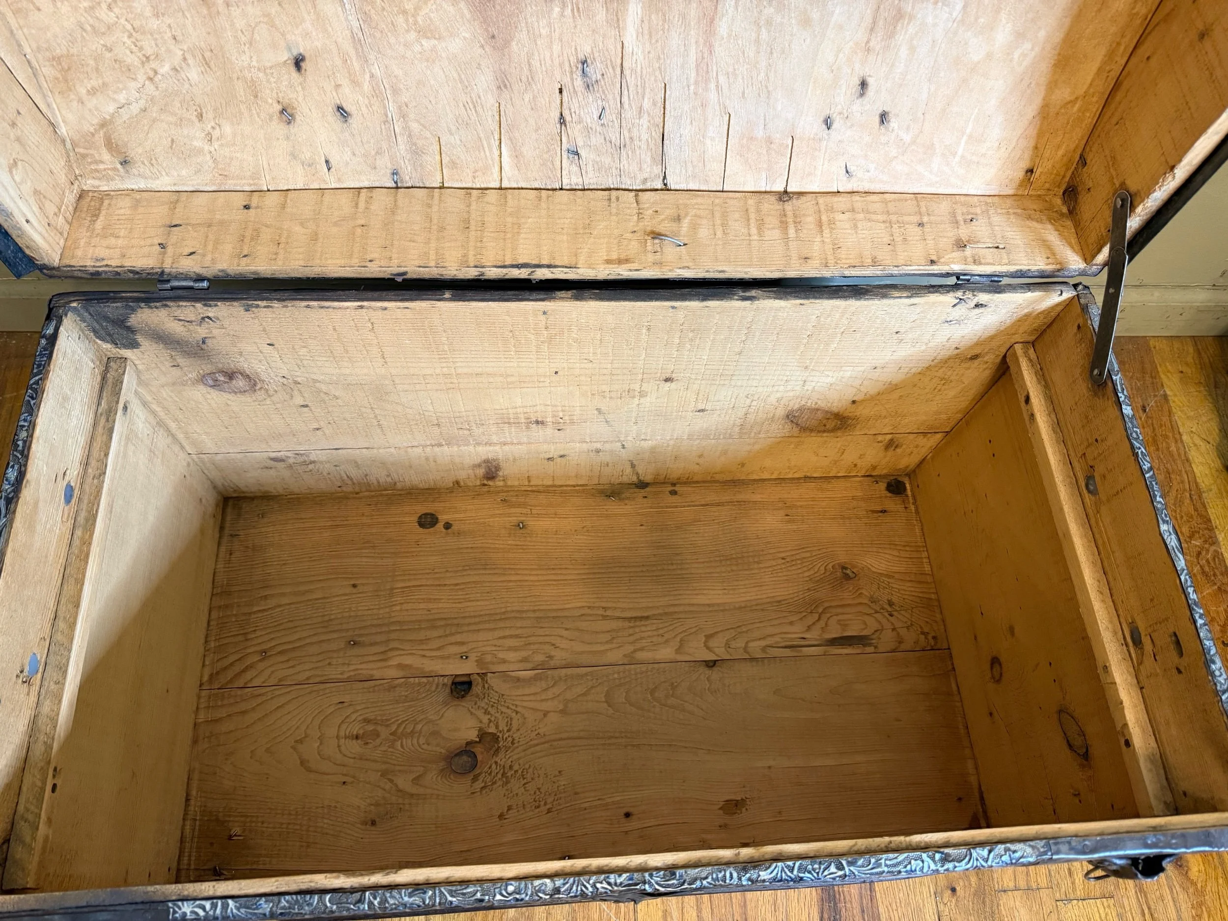 Natural wood interior of Victorian antique storage chest