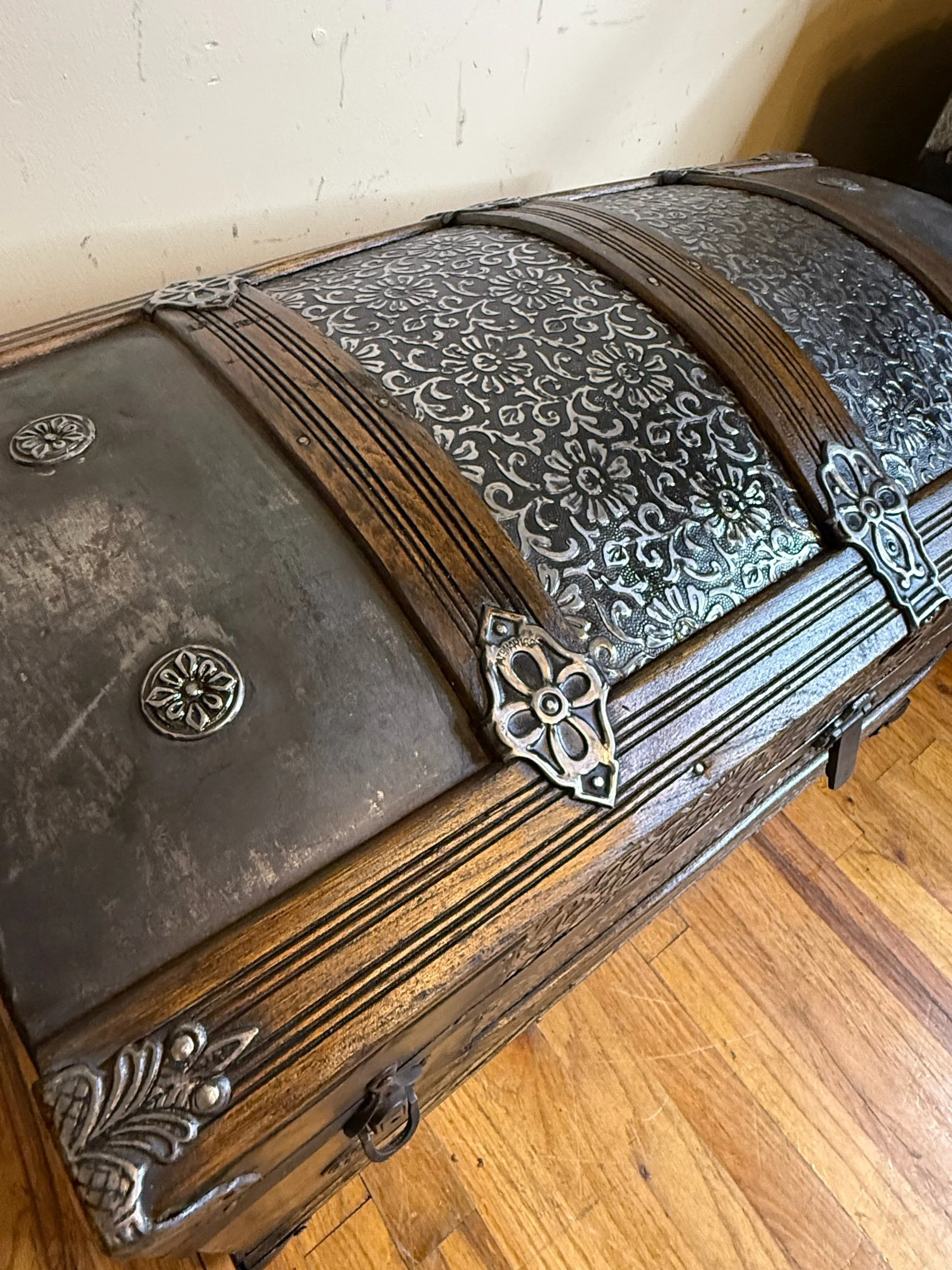 Victorian Saratoga dome top trunk with floral embossed tin