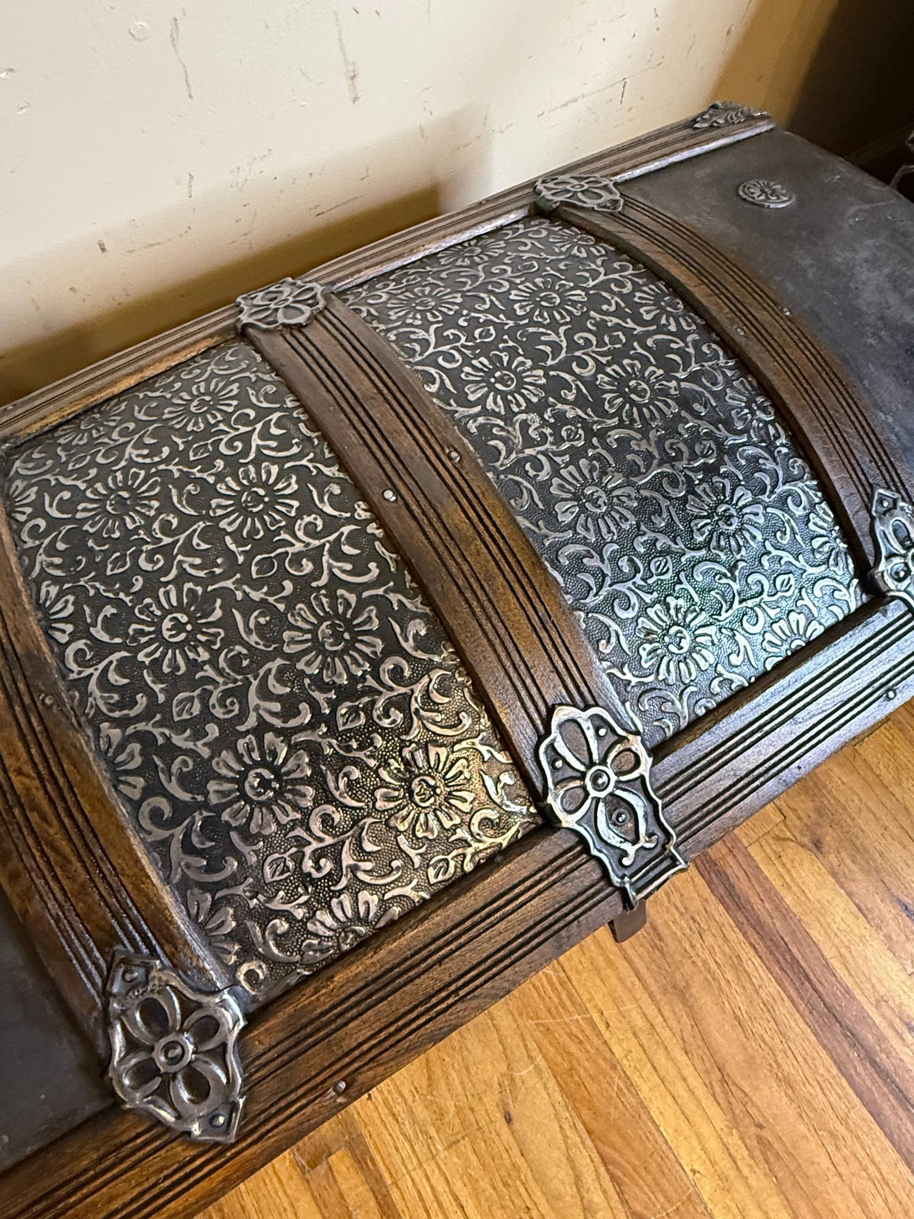 Black Victorian antique trunk with walnut stained oak slats
