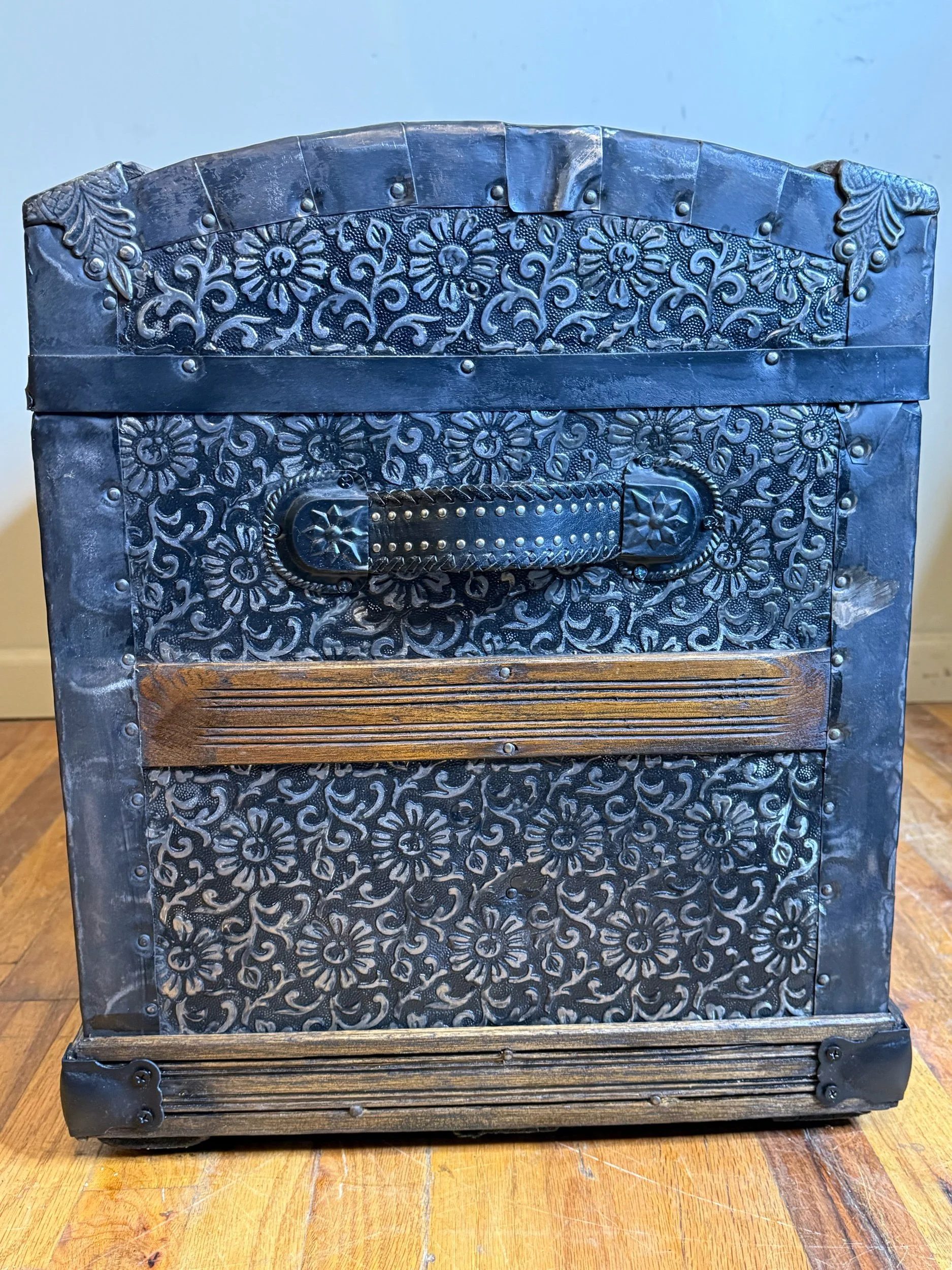Professionally refinished floral embossed tin Saratoga trunk