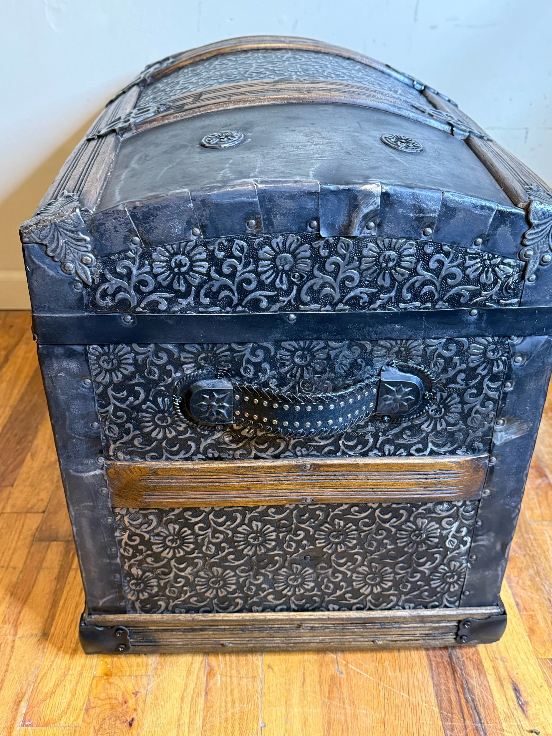 Victorian dome top antique trunk viewed from the side