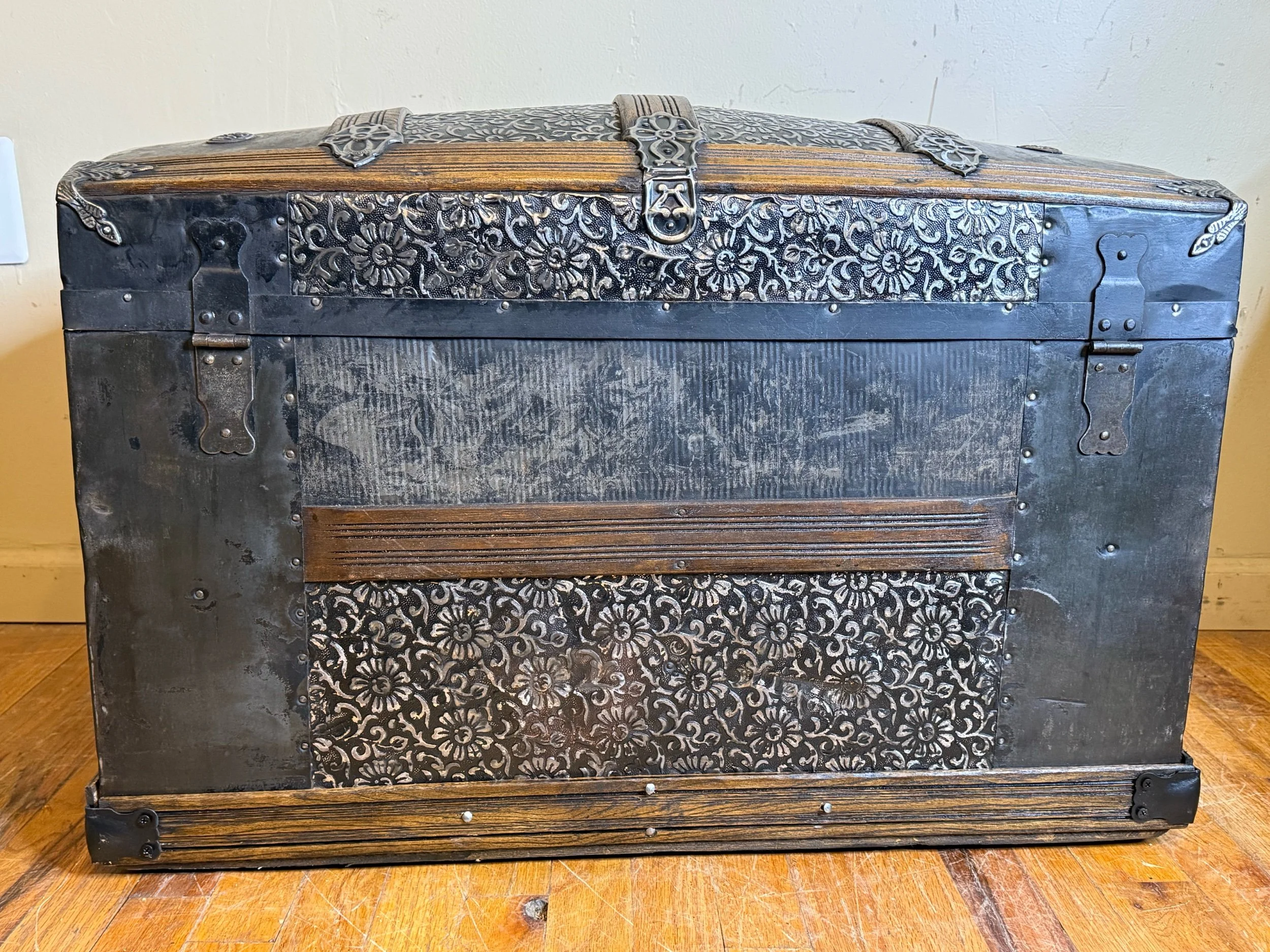 Original metal hardware on 1800s antique steamer trunk