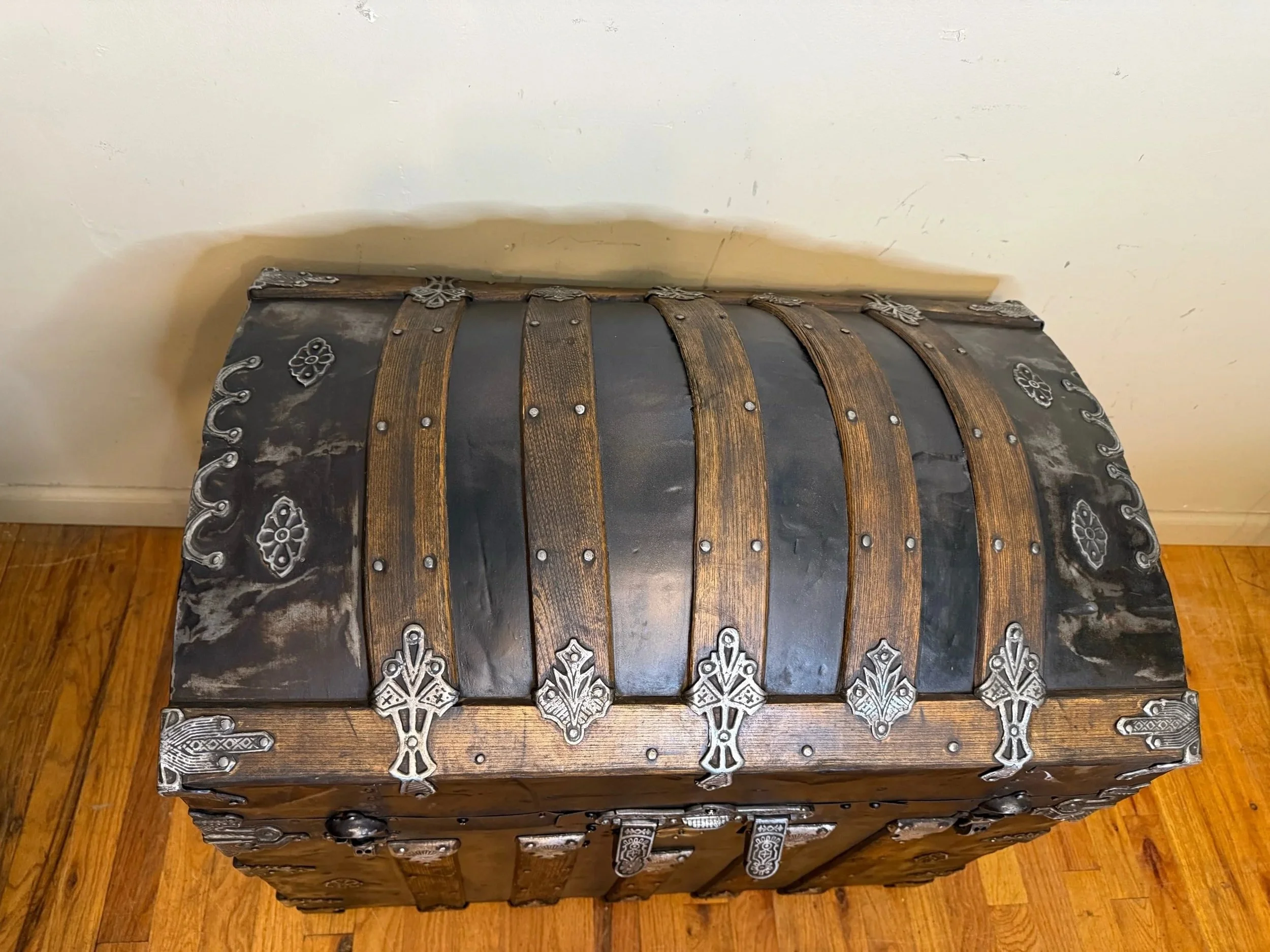 Refinished Victorian humpback trunk in shabby black finish.jpg