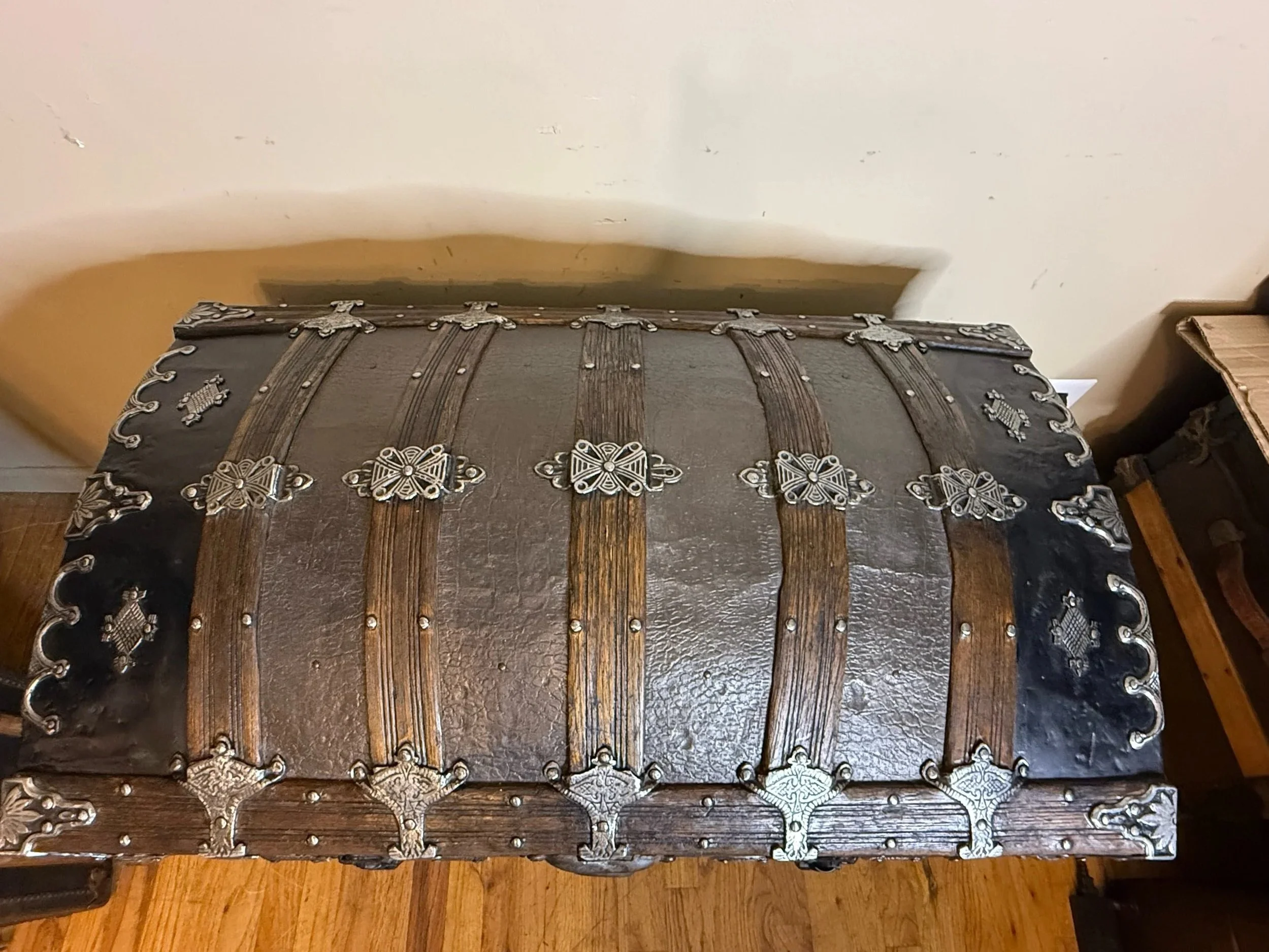 35 inch antique steamer trunk professionally refinished in brown and black