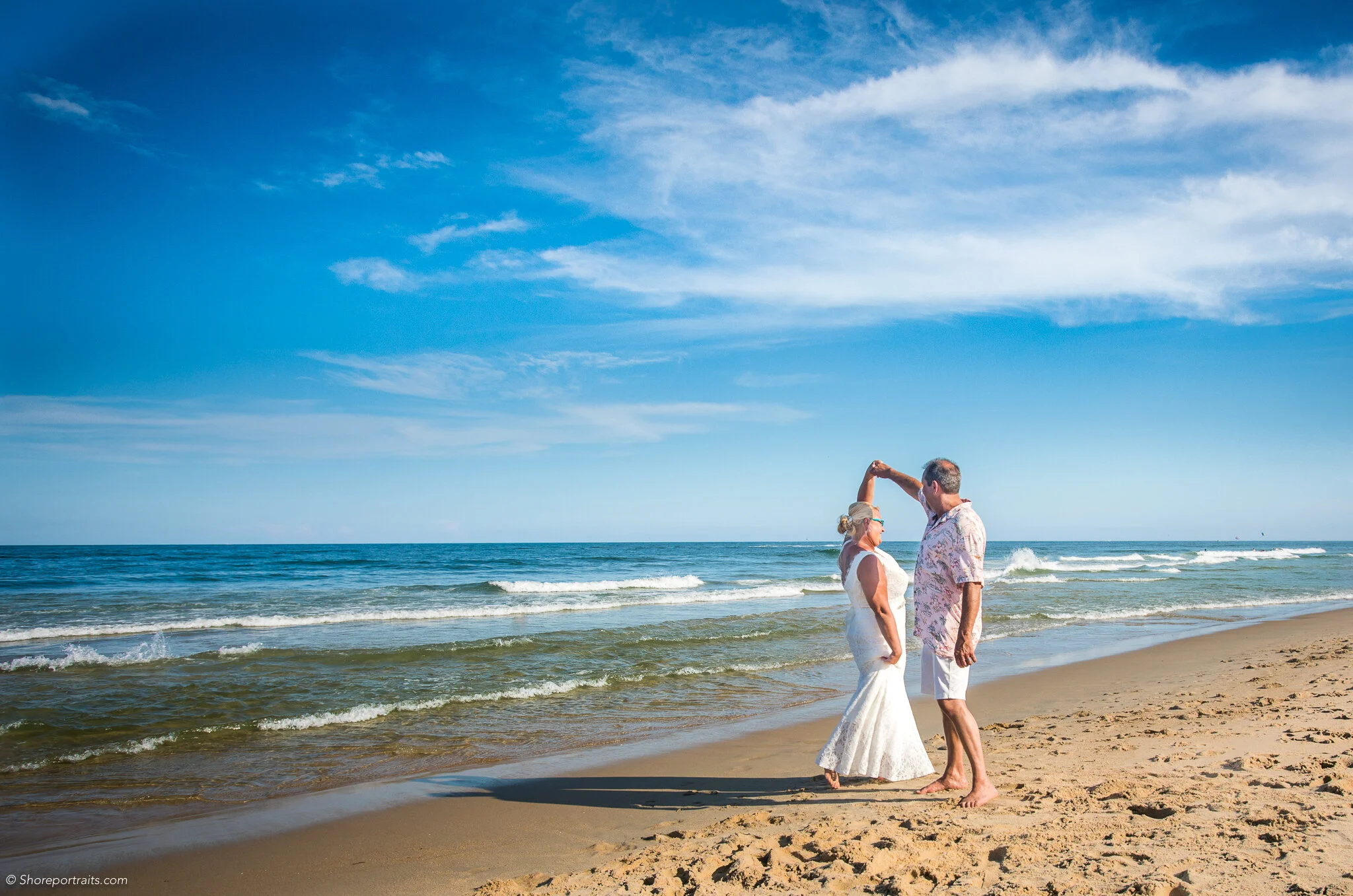 Love this wide-angle shot of Shari &amp; Paul at their Ocean City, MD wedding this past July! :)