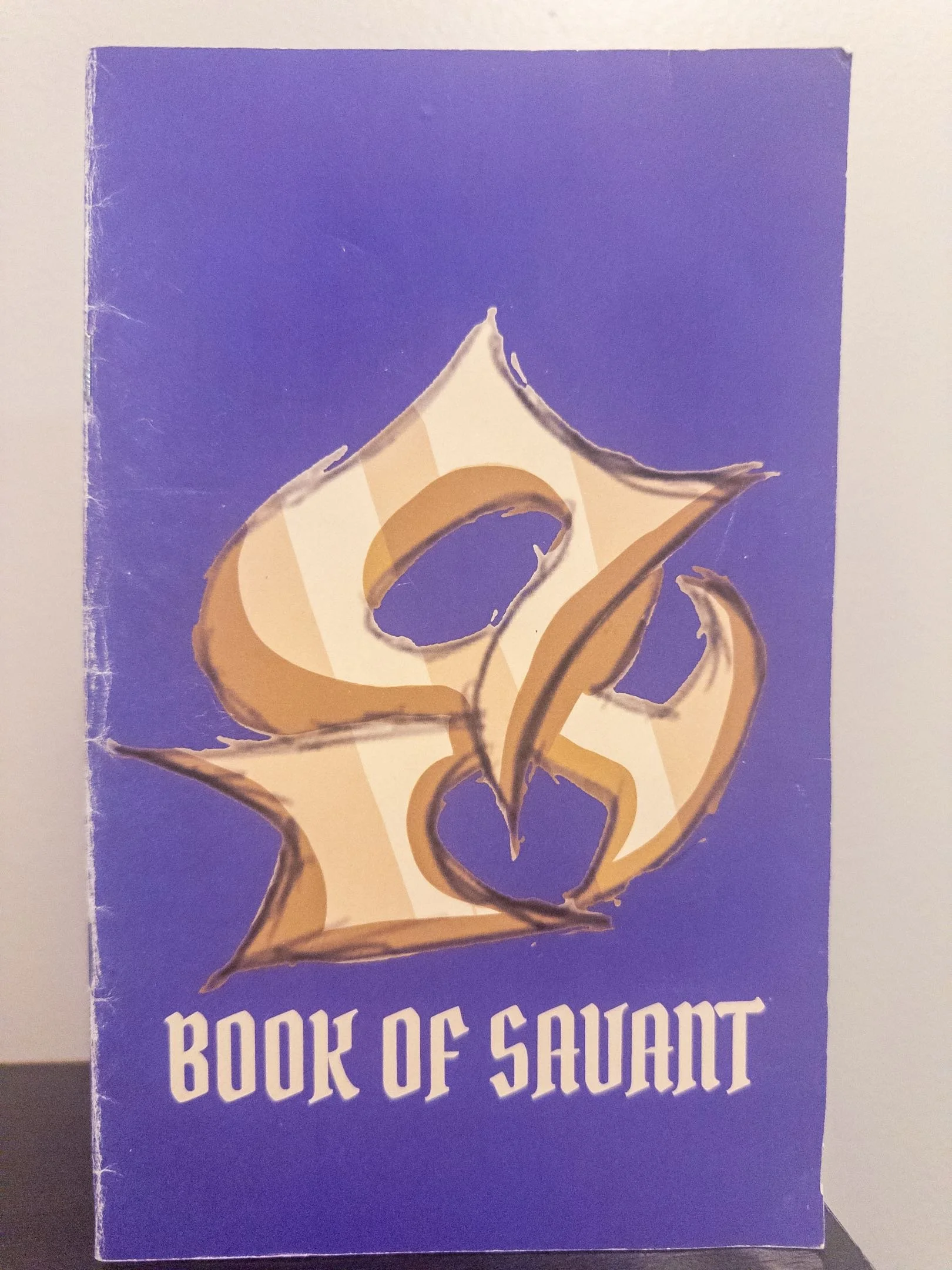 Book of Savant on the front cover side