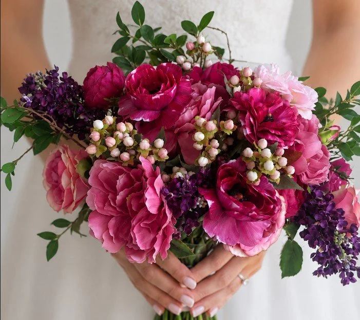 Love Bridal Boutique in bride's hands - tight shot.jpg