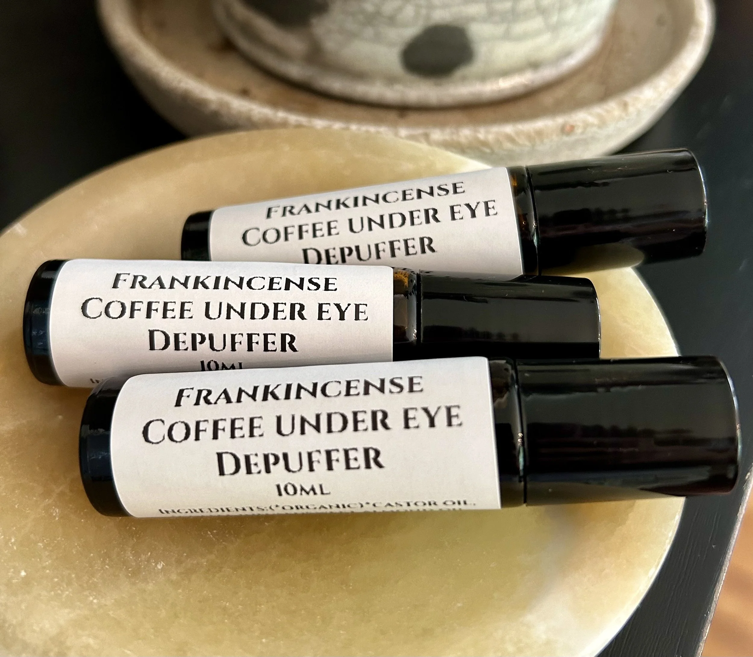Frankincense coffee under eye depuffer