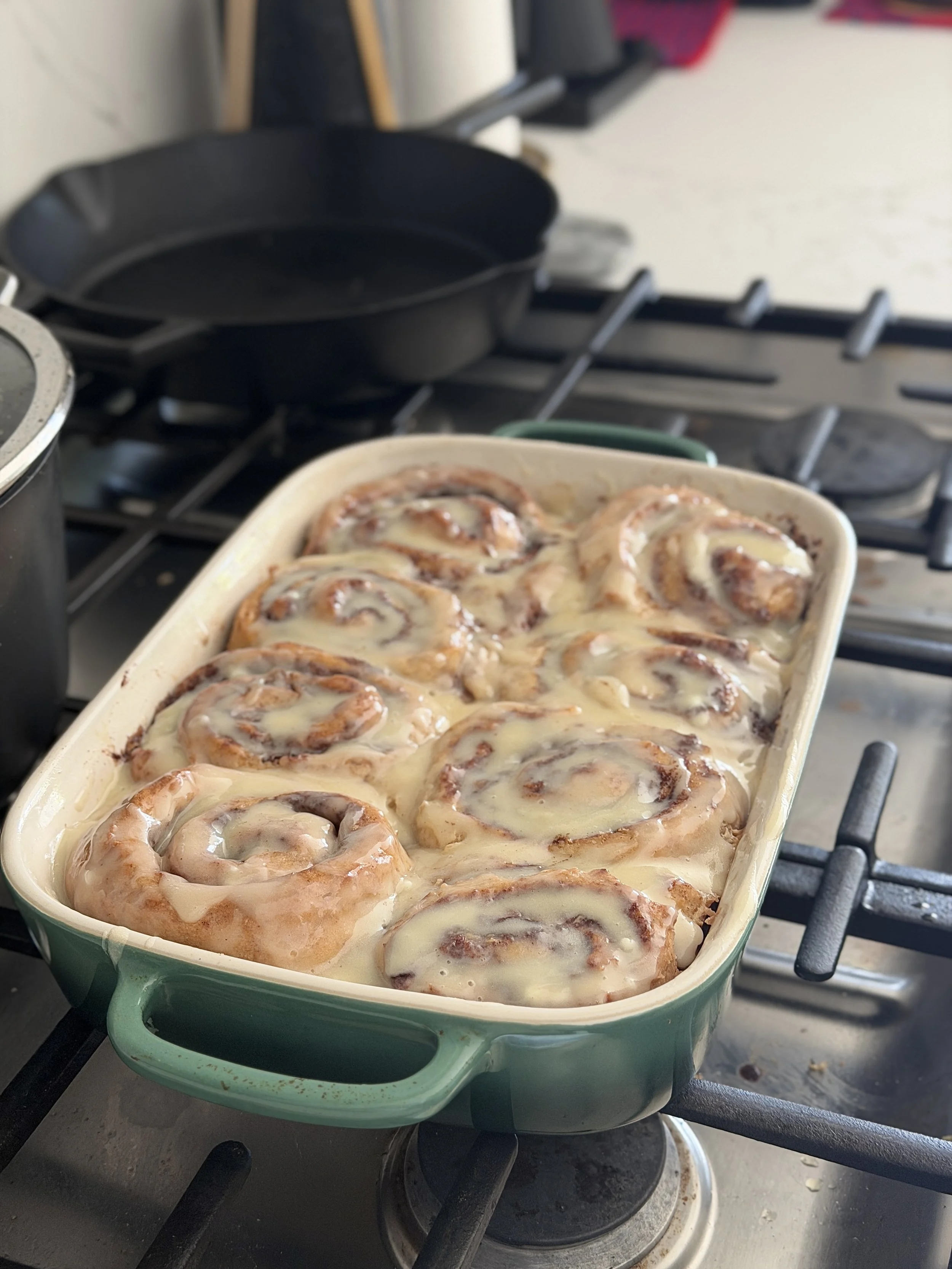 Cinnamon rolls with cream cheese frosting and sweet baked goods from The Common Crumb