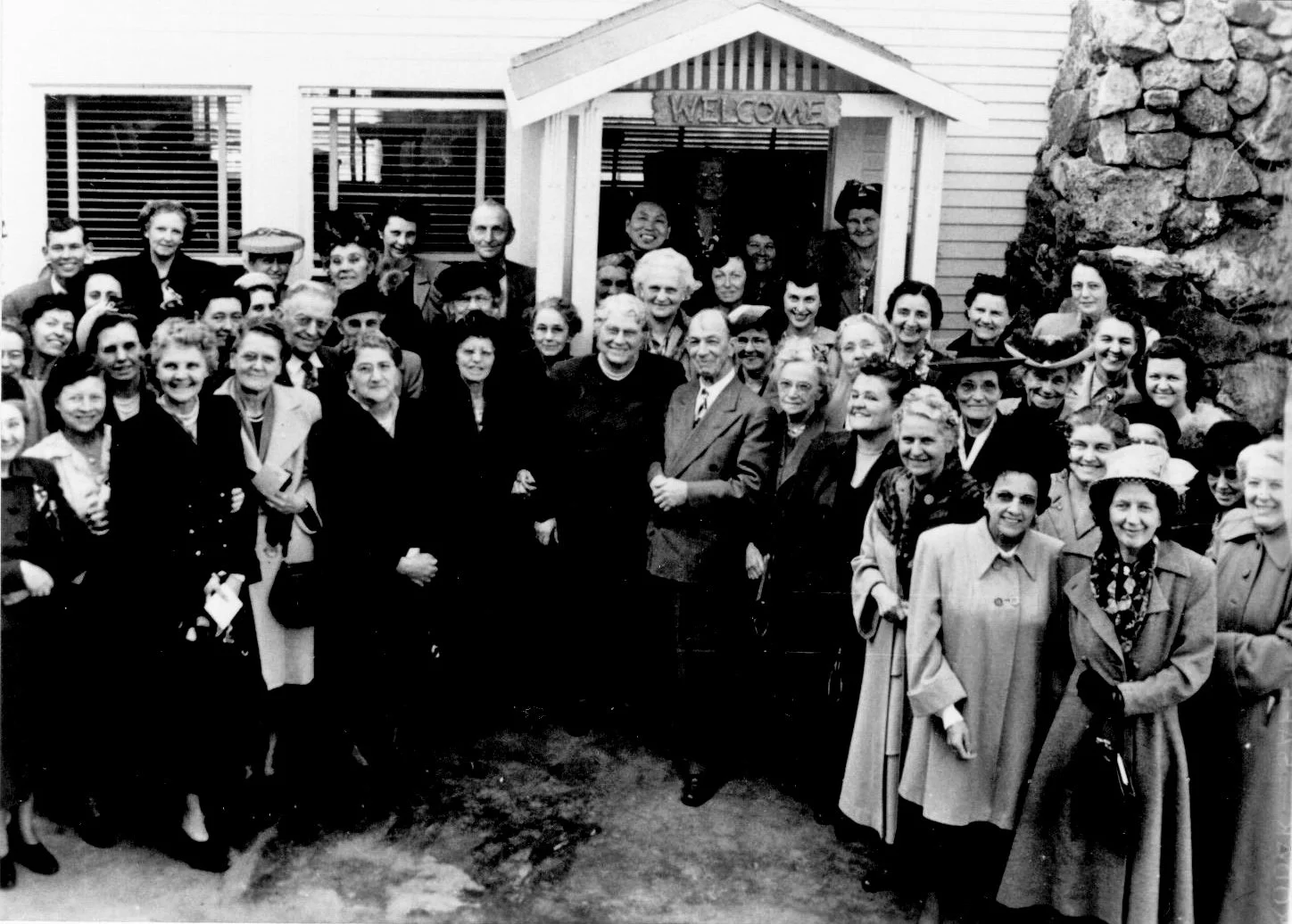 Go-Ye Fellowship members in front of the large chapel in the Prayer Garden, 1960