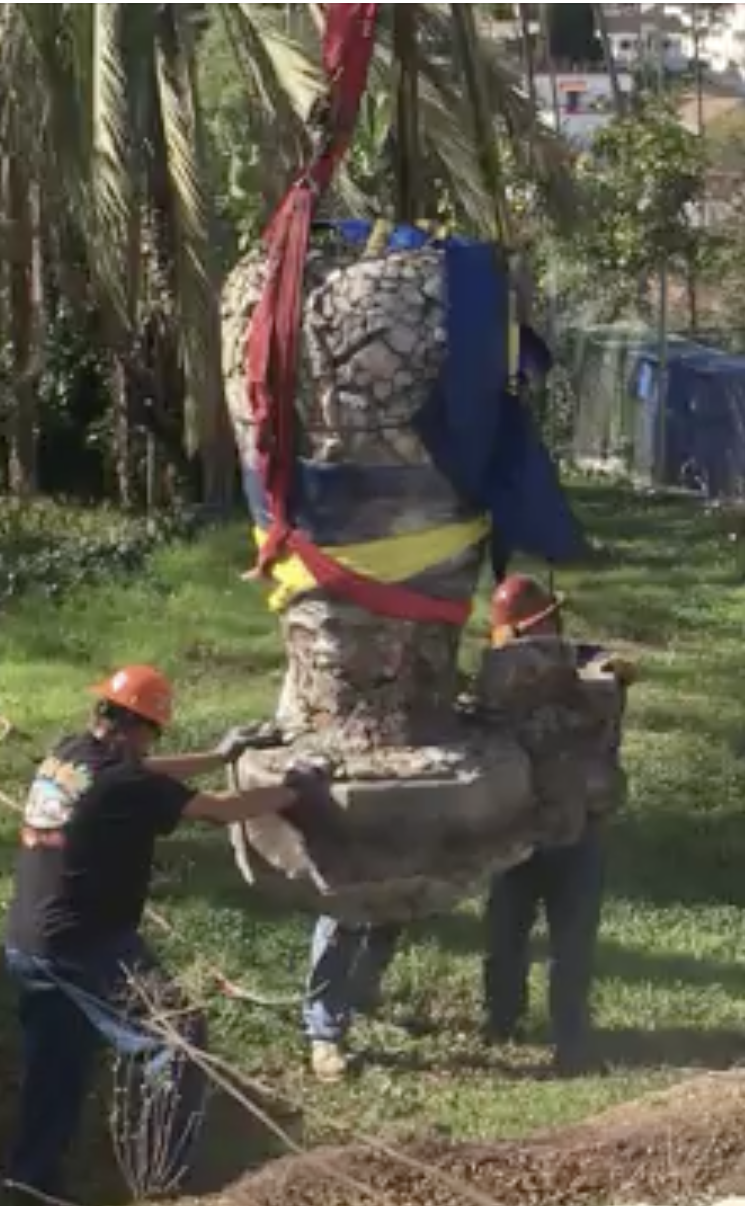 Contractors dug the Victory Vase out of the ground, cut the stabilizing pipe, and lifted it by a several ton crane up to the street for transporting to Biola in 2018.