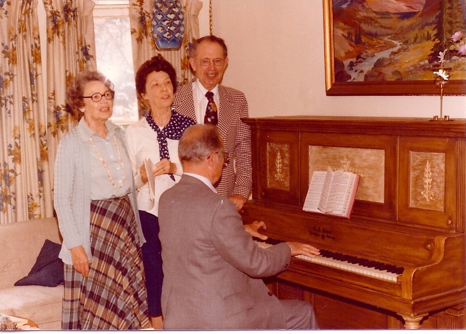 Andrew and Sadie's children, Bryant, Jean, Helen and Hubert singing at the piano in the home they grew up in, 1307 Waterloo St., Los Angeles. 