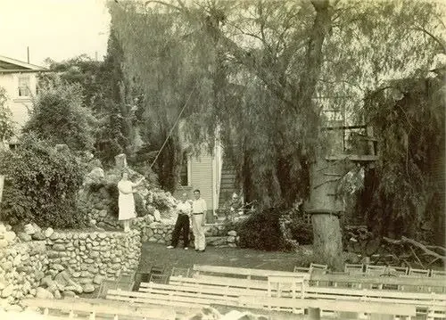 The Victory Vase stood just to the left of this well-loved pepper tree on the family compound. Andrew and Jennie's daughter Marietta is getting ready to swing on the swing as Andrew and Bryant stand nearby. Notice the pews for the outdoor Go-Ye Fello
