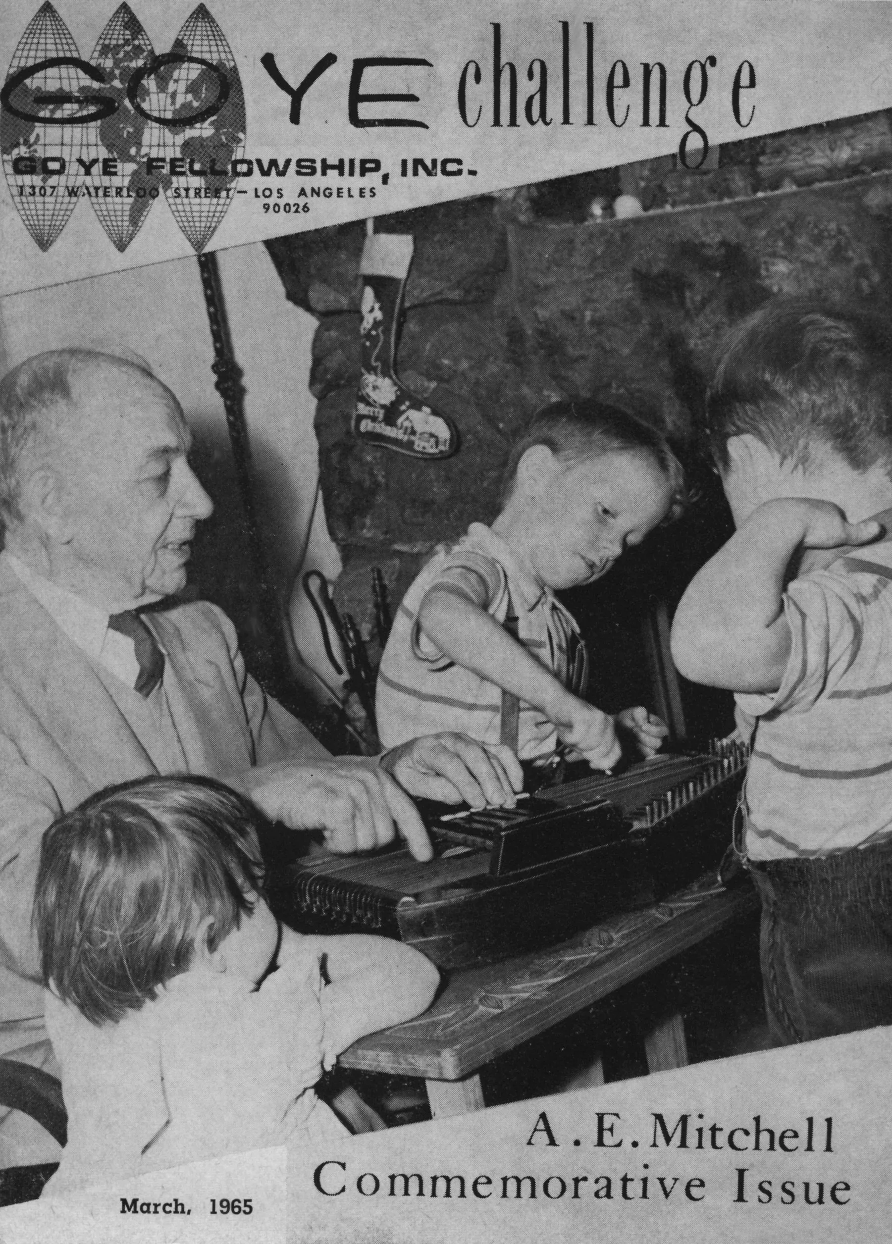 Andrew featured on the cover of the Go-Ye Challenge magazin playing his harp with his grandchildren