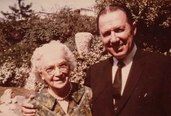 Hubert and his Aunt Eva (Andrew's sister) in the Go-Ye Prayer Garden with the Victory Vase in the background