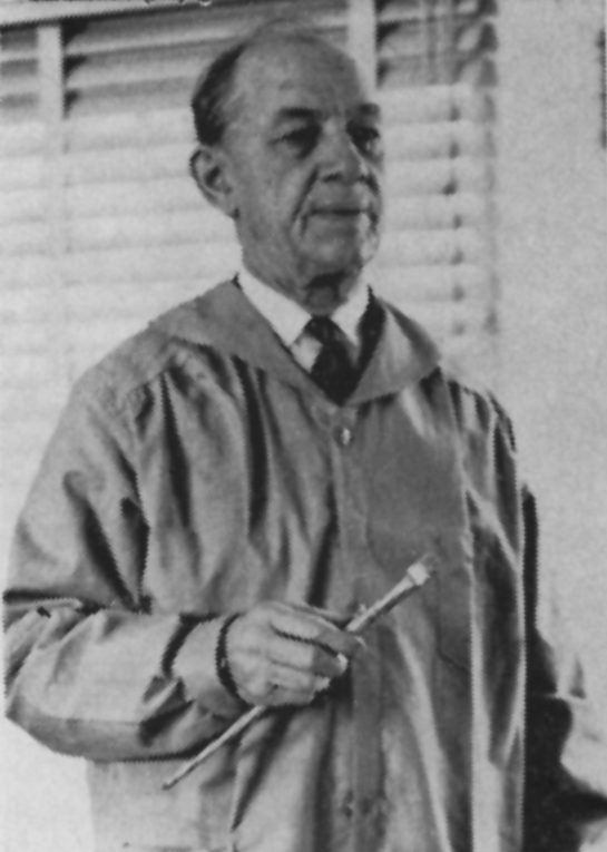 Andrew with paint brush in hand. 