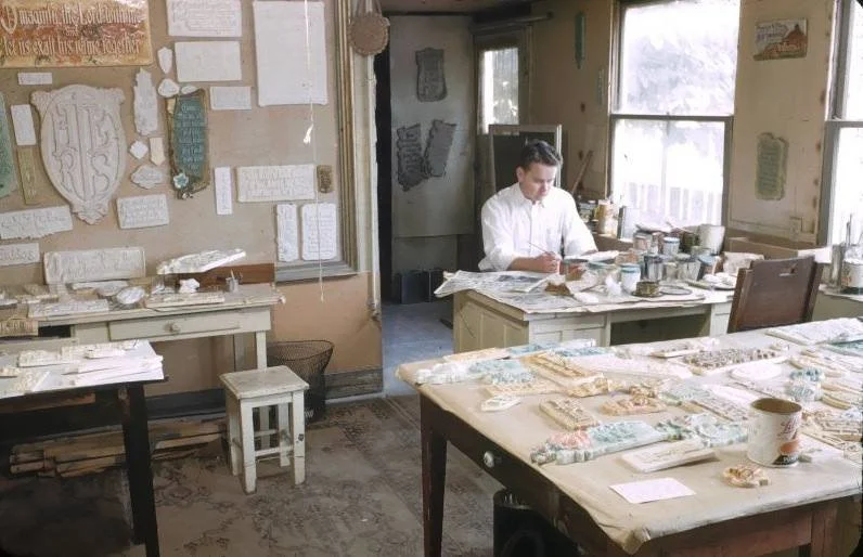 Kaare Wilhelmsen, Andrew's son-in-law, working in the plaque workshop