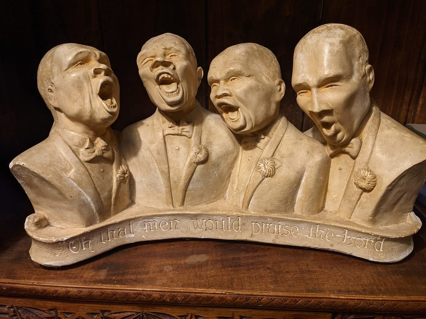 "The Quartet" - A.E. Mitchell may have created the wording on the strip below the quartet only, but we do have the mold for the entire piece so it is a bit of a mystery. See the Research section. 