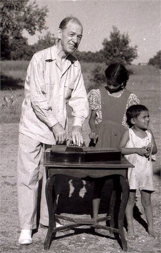 Andrew playing his autoharp in India