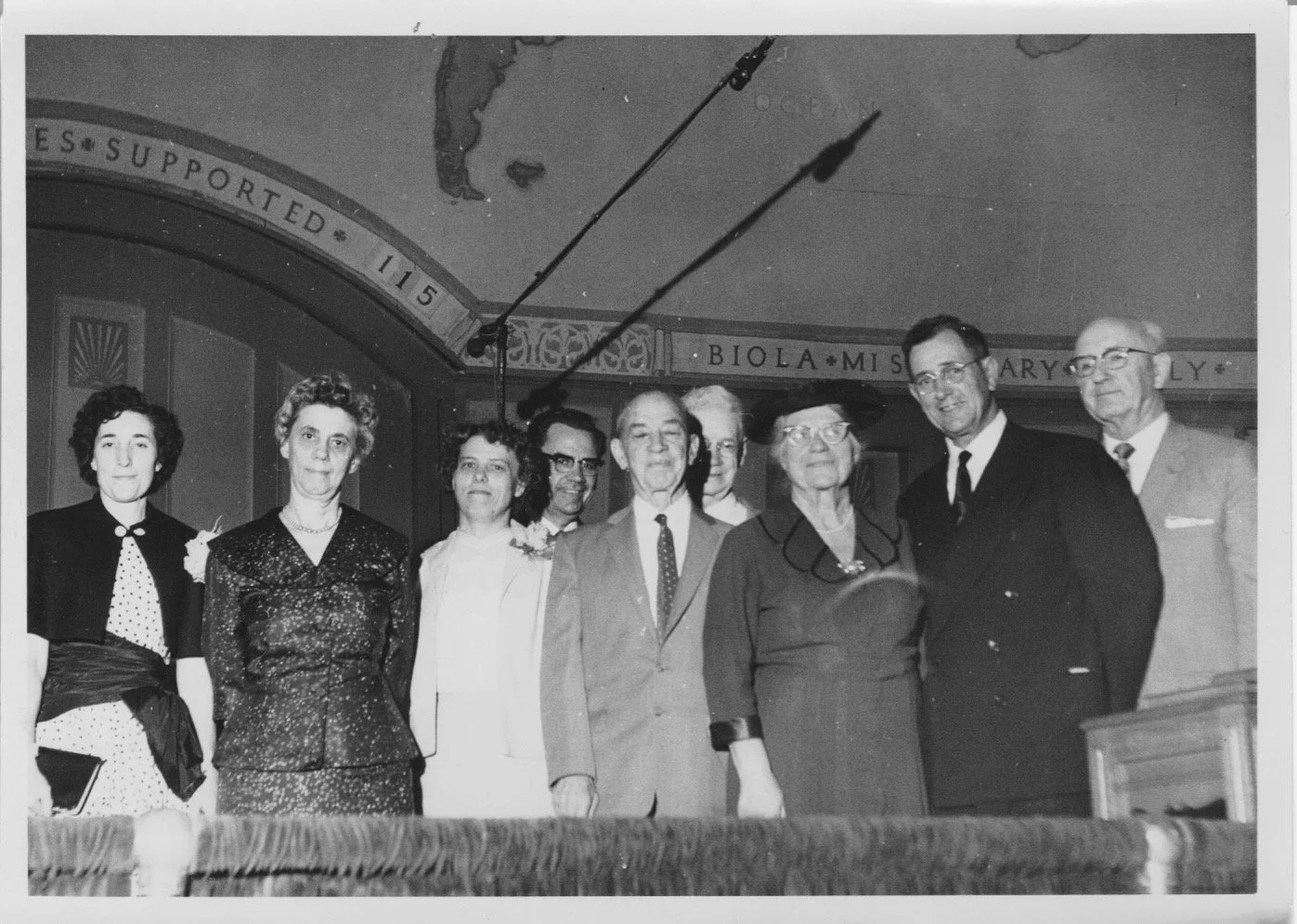 The Mitchells with staff, son-in-law David Morken in the back and Church of the Open Door/Biola leaders. 