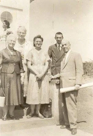 Andrew holding plans for perhaps the plaque workshop construction (?), Brazil, early 1960s