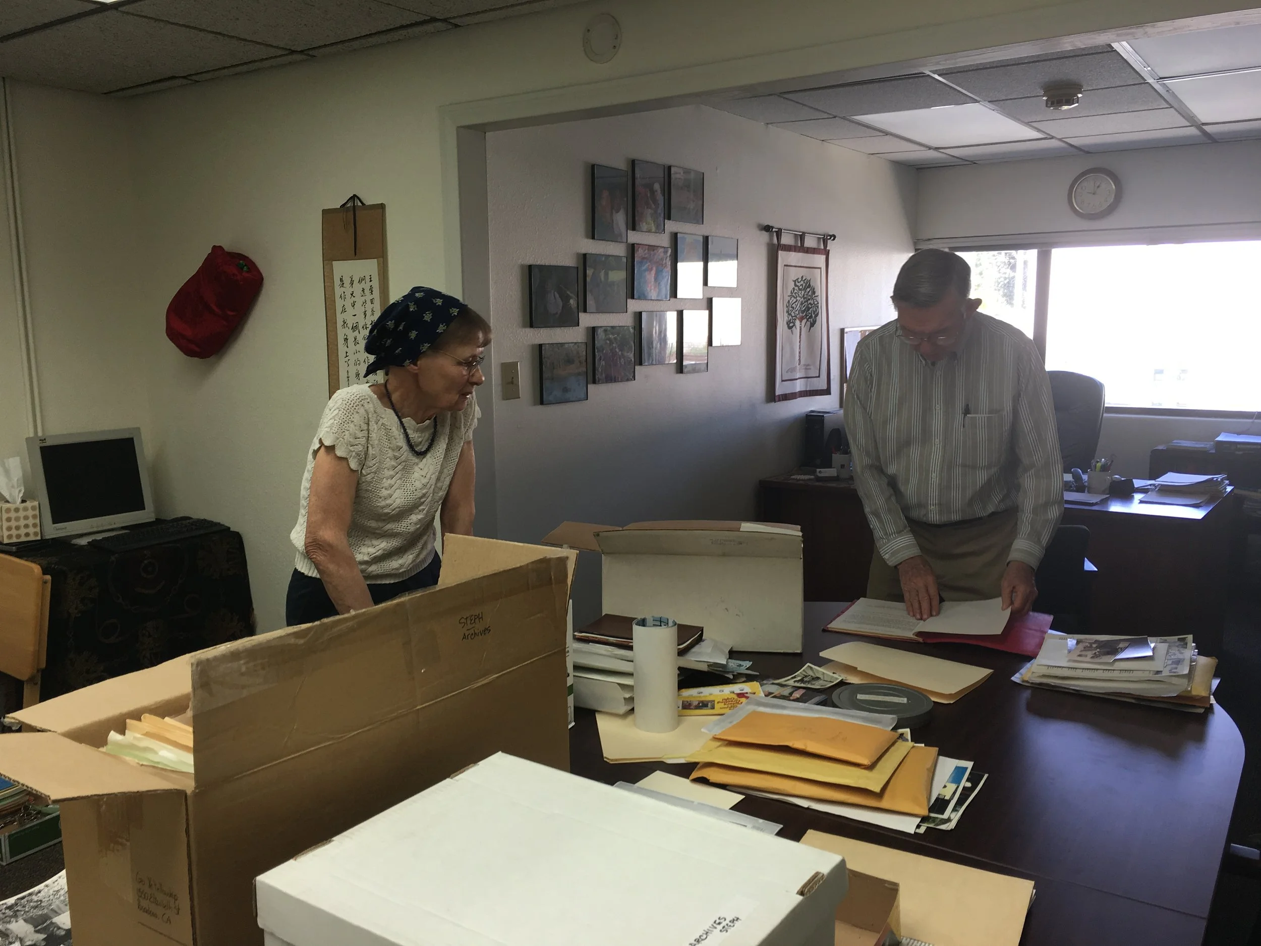 The Go-Ye Fellowship office in 2017. Family and staff gathered to organize the archives. That is Andrew's grandson David Mitchell and long-time staff member Stephanie. 