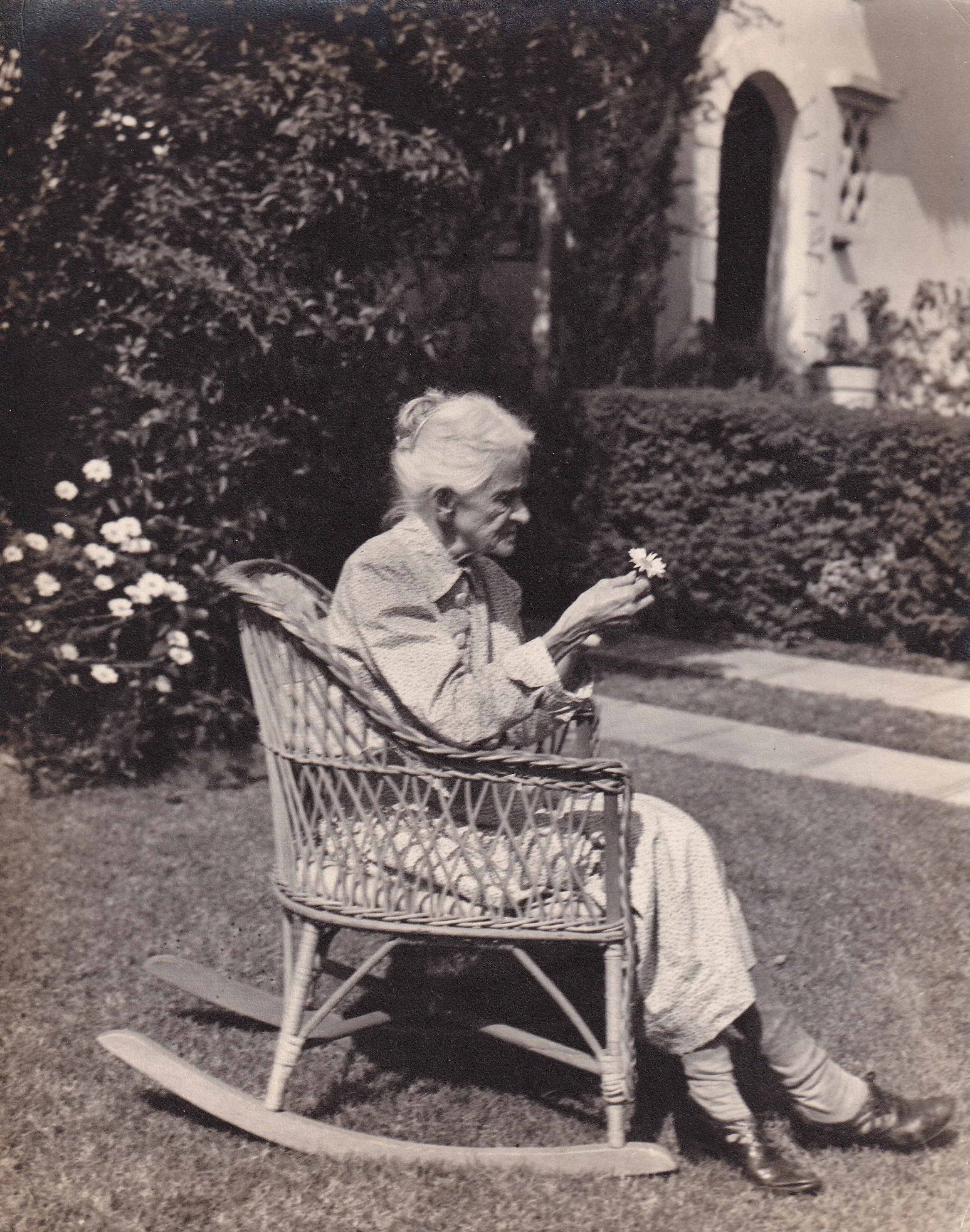 A.E. Mitchell's mother Martha Mitchell in her front yard in Los Angeles