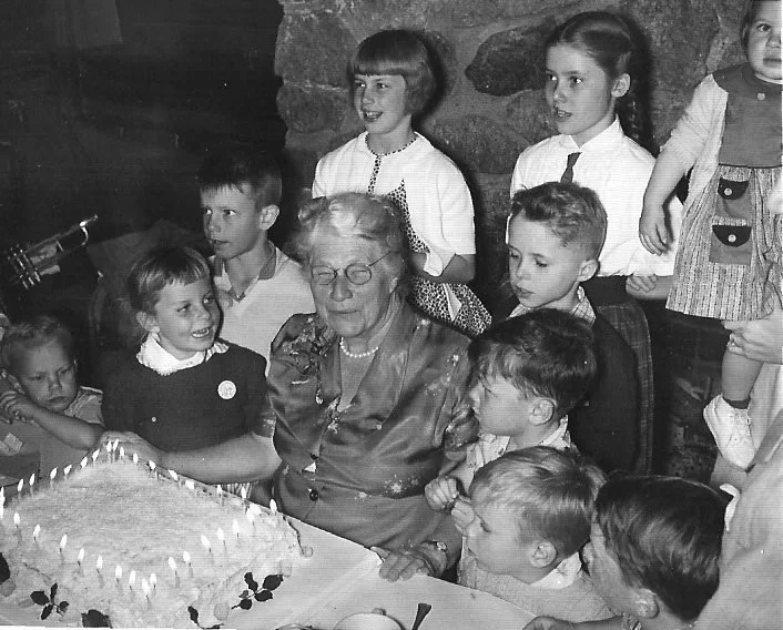 Jennie Mitchell on her birthday with the grandchildren in June, 1957