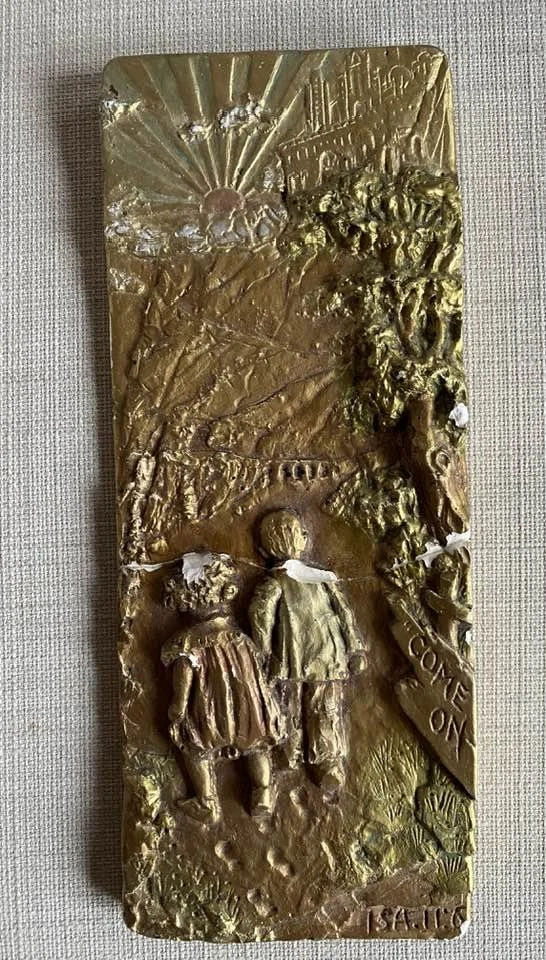 "Come On" in plaster