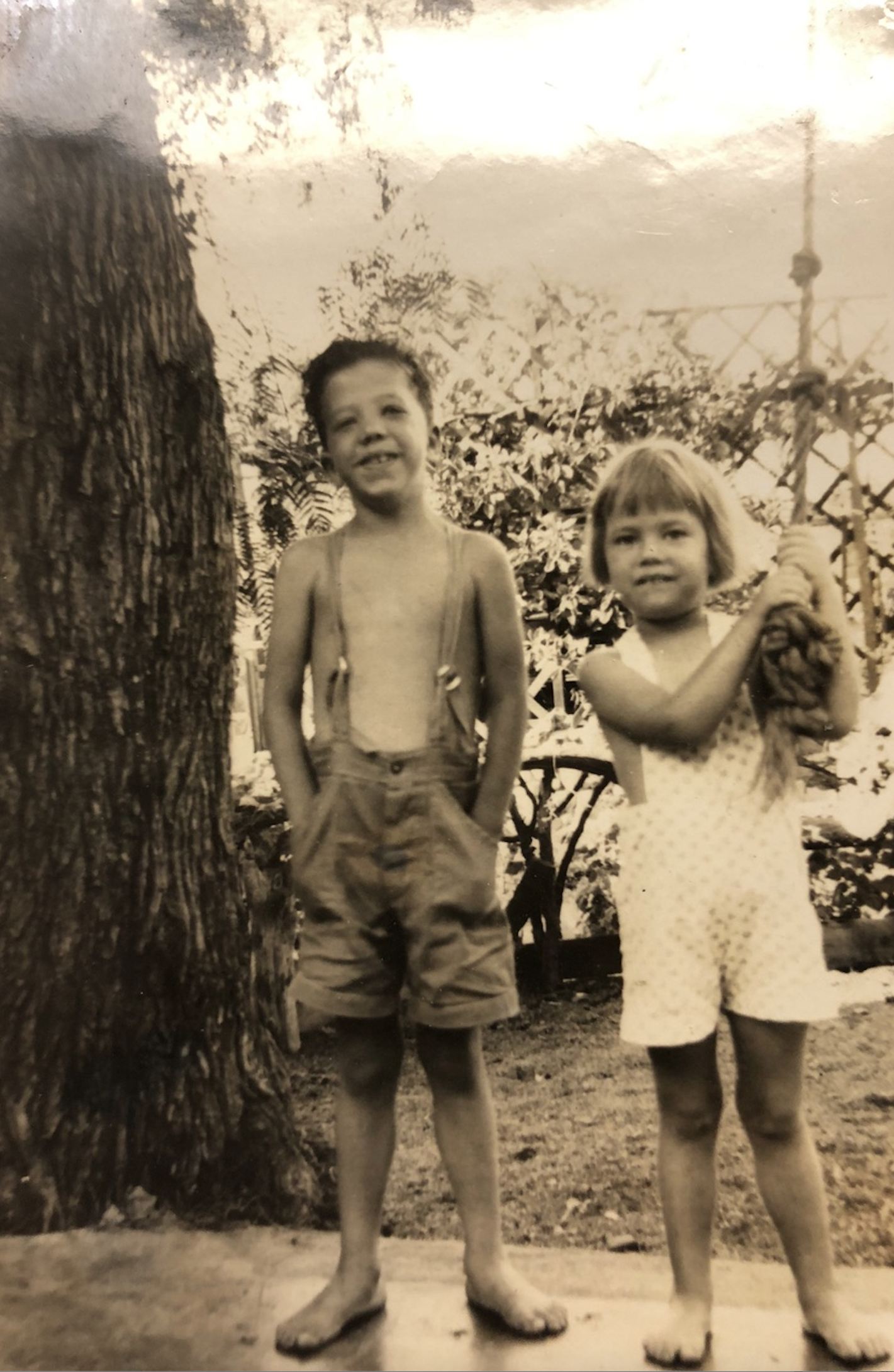 A.E. Mitchell grandchildren Daniel and Jean Marie (Hubert's children) getting ready to swing from the pepper tree. See previous photo descriptions. 