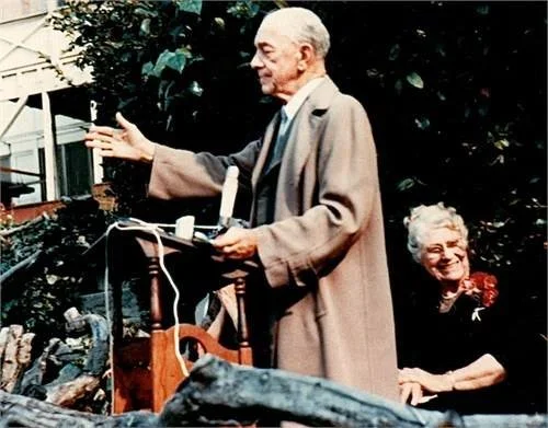Andrew preaching at a Go-Ye Fellowship service in the back yard of the family compound - Jennie to the right. This was the spring of 1964 right before he passed away. 
