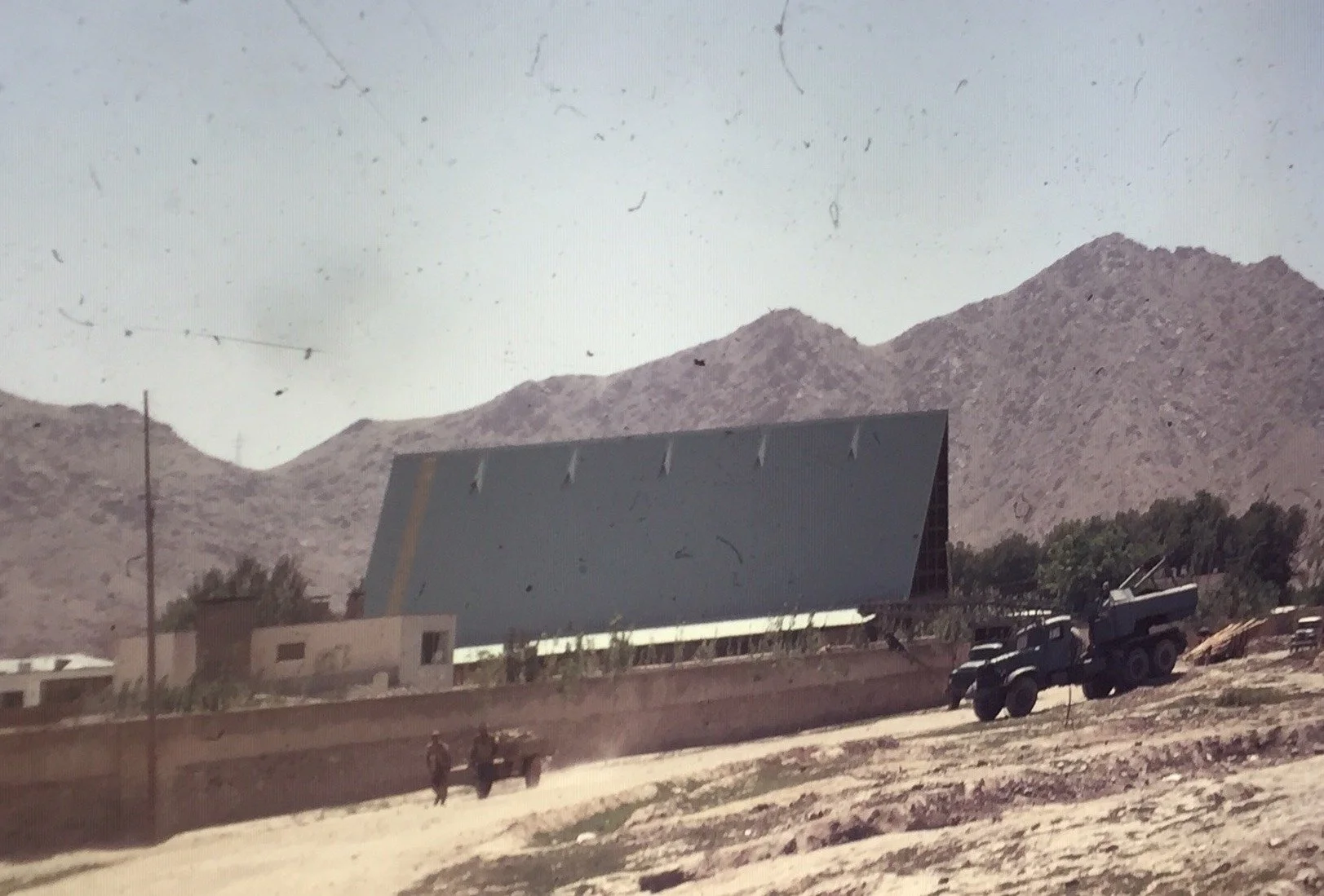 Church in Afghanistan A.E.'s daughter Jean and husband Kaare Wilhelmsen, along with A.E.'s daughter Helen and husband David Morken. This is the day the church was being torn down by order of the government. 