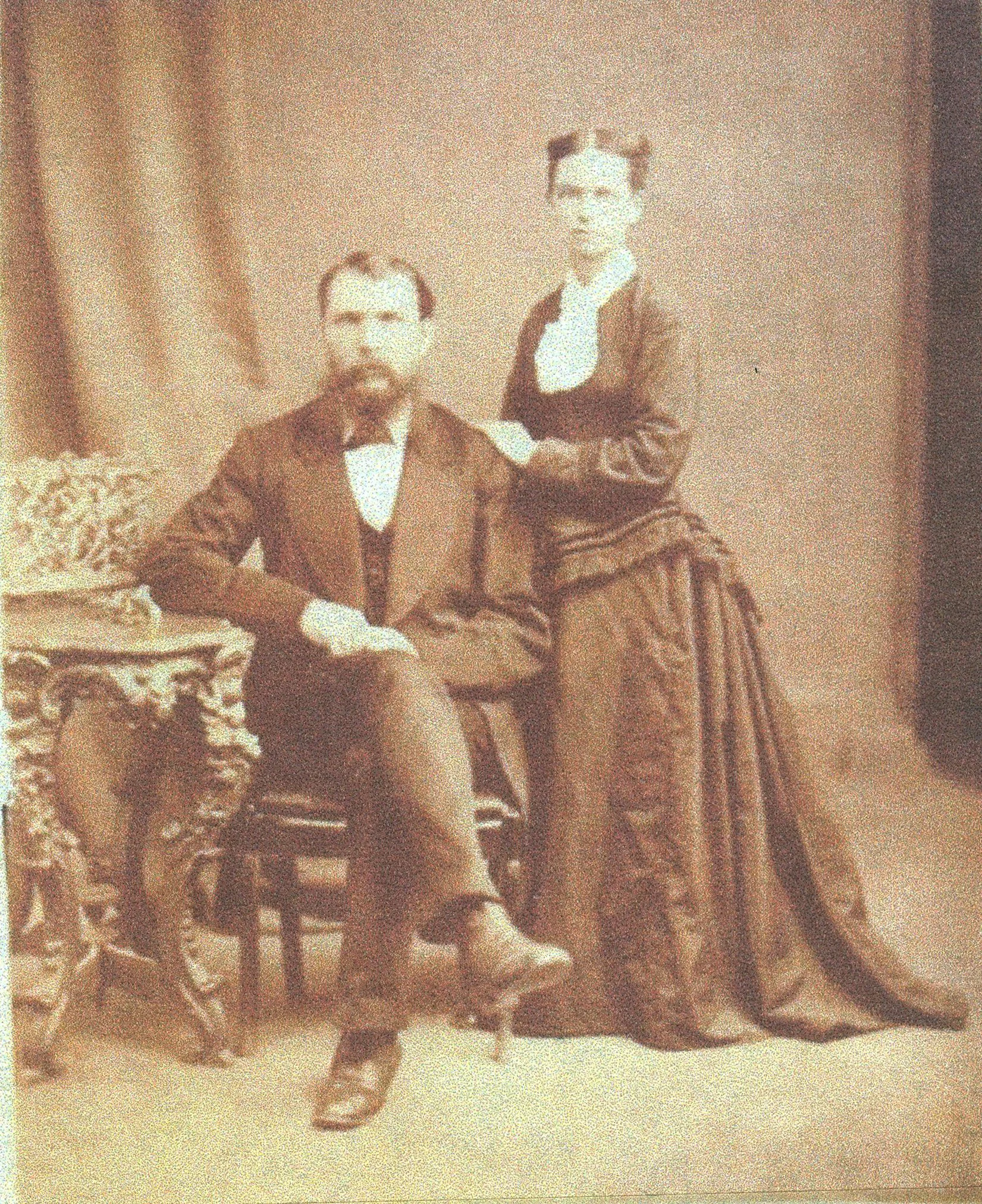Robert and Martha Mitchell, A.E.'s parents. Elora, Canada. Robert owned a saddlery and Martha had a confectionary shop in the same building. The family lived upstairs, downtown Elora. The home was once used for a Hollywood movie, Mrs. Soffel. 