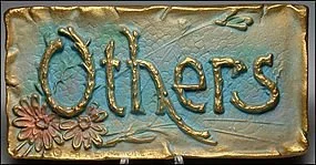 "Others" plaque in blue - The cobblestone pattern was common to see in the background of the plaques but the lettering on this one is very unique and rare. It looks like little branches. 