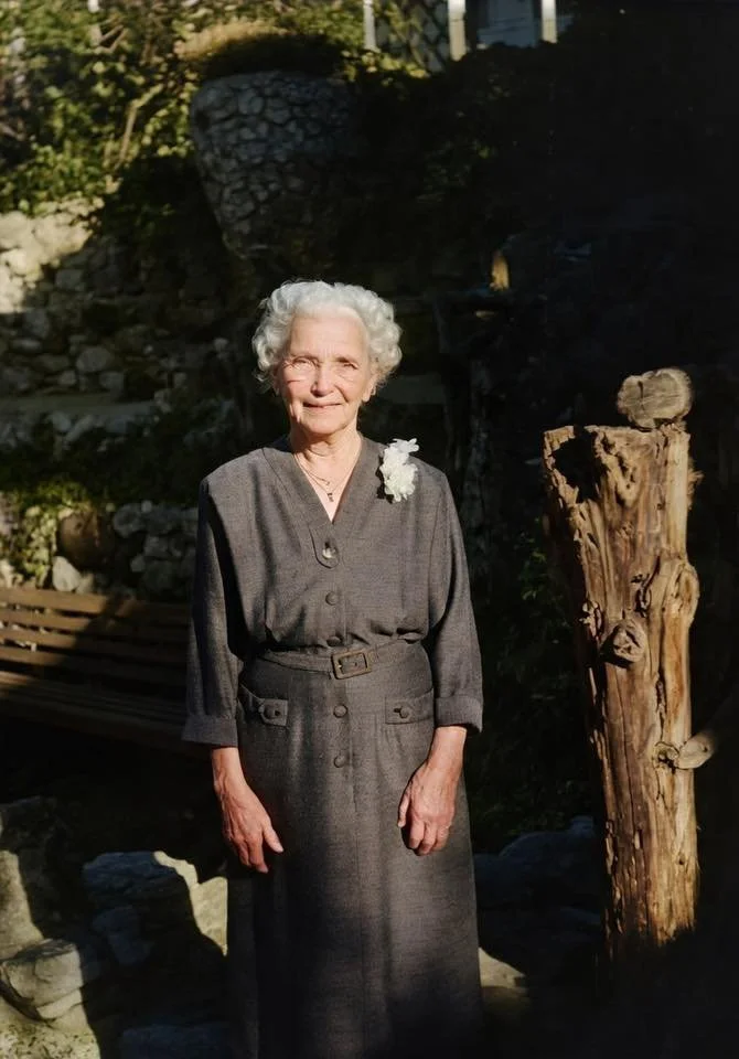 Eva Mitchell, Andrew Mitchell's sister, in front of the Victory Vase. Photo colorized by her grand niece Eva. 