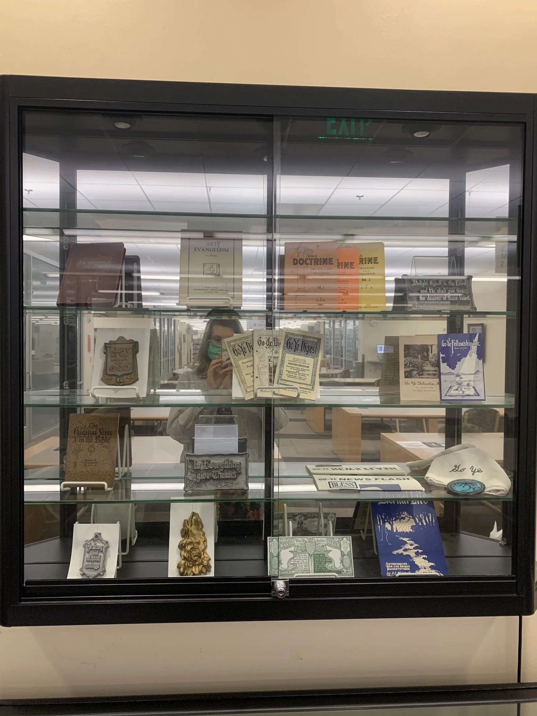 A.E. Mitchell art and writing display in the Biola Library