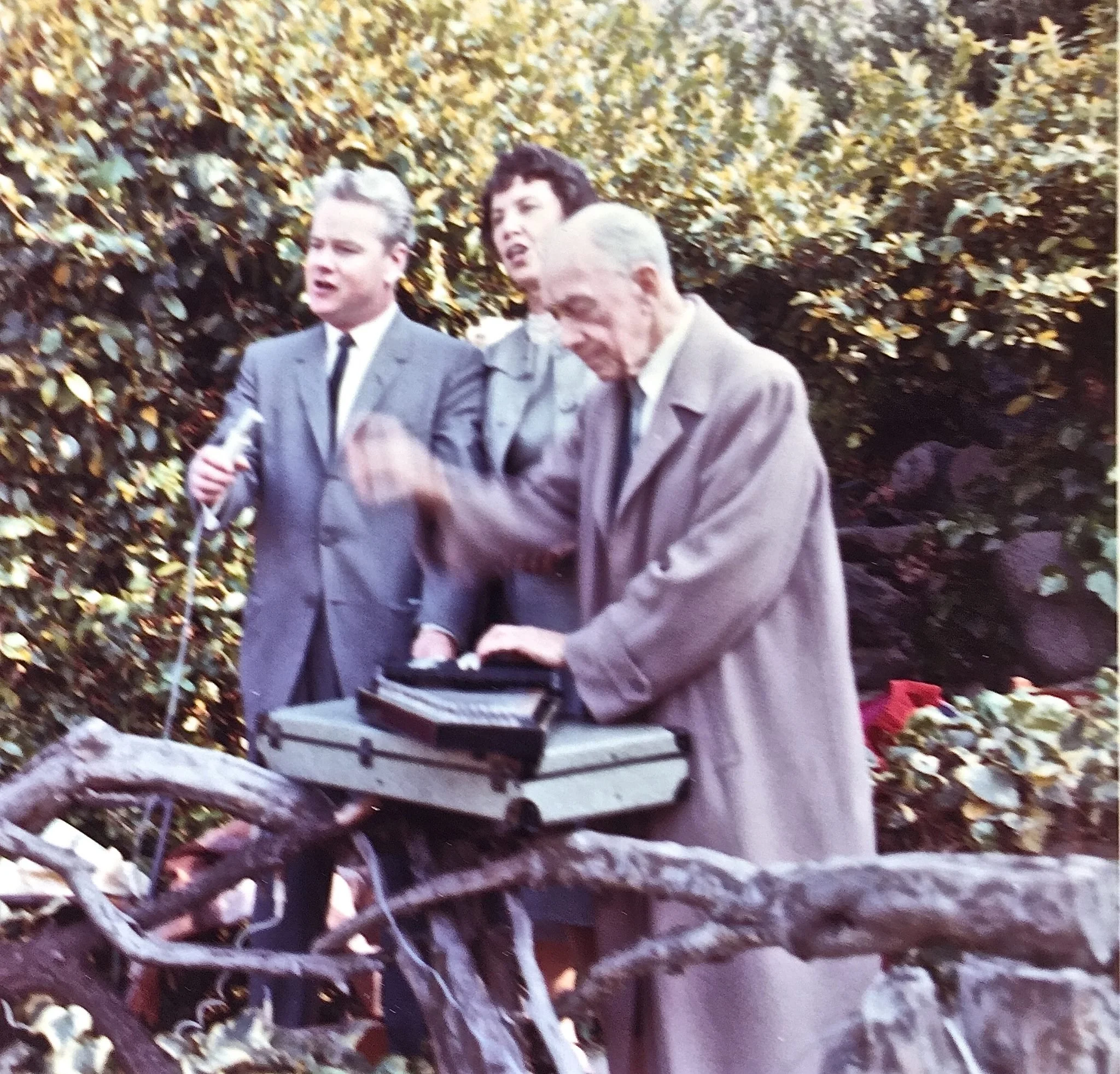 Kaare and Jean Wilhelmsen leading songs in a Go-Ye Fellowship service with Andrew on autoharp