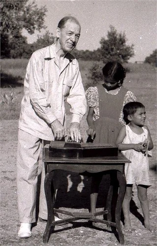Andrew in Trinidad playing his autoharp

