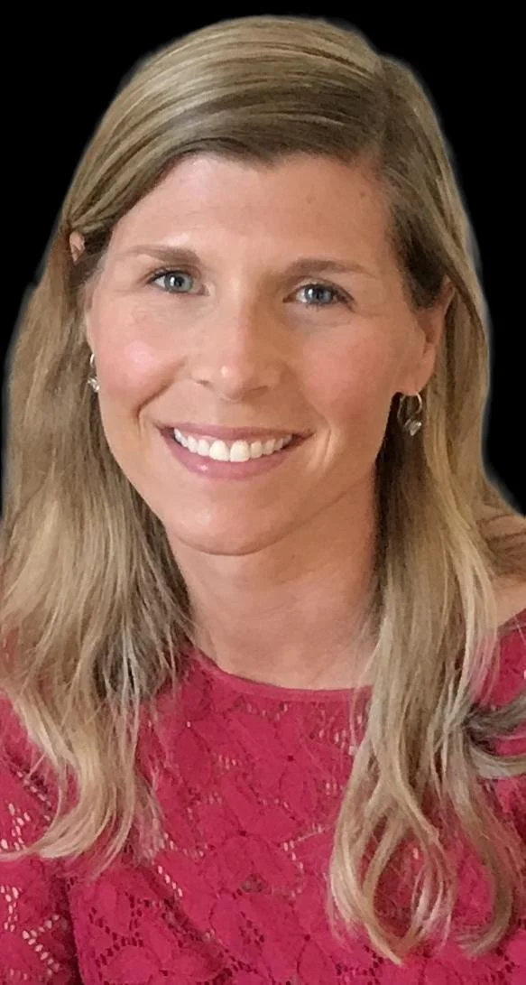 A woman with long blonde hair, blue eyes, and a bright smile, wearing a red lace top and earrings, against a black background.