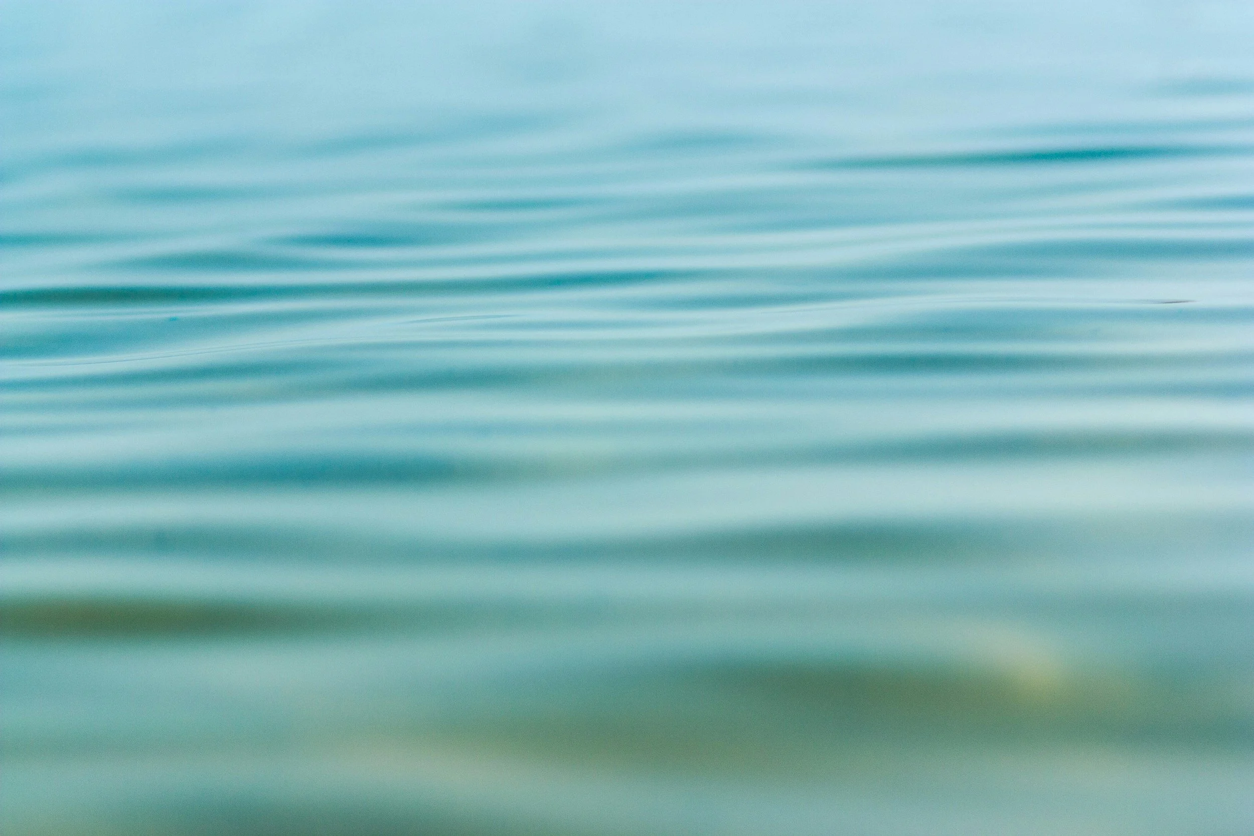 Close-up of calm ocean water with gentle ripples.
