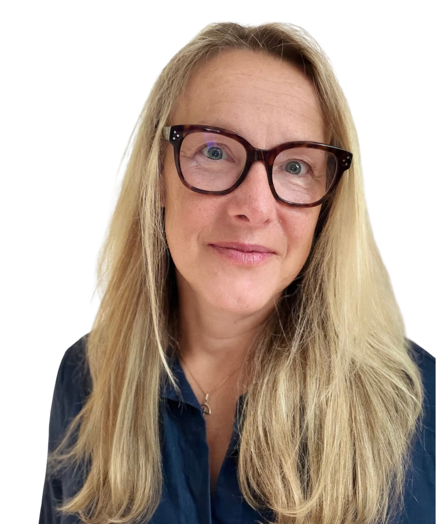 Stephanie Schuh Life Coach wearing a navy blue shirt and reading glasses smiling