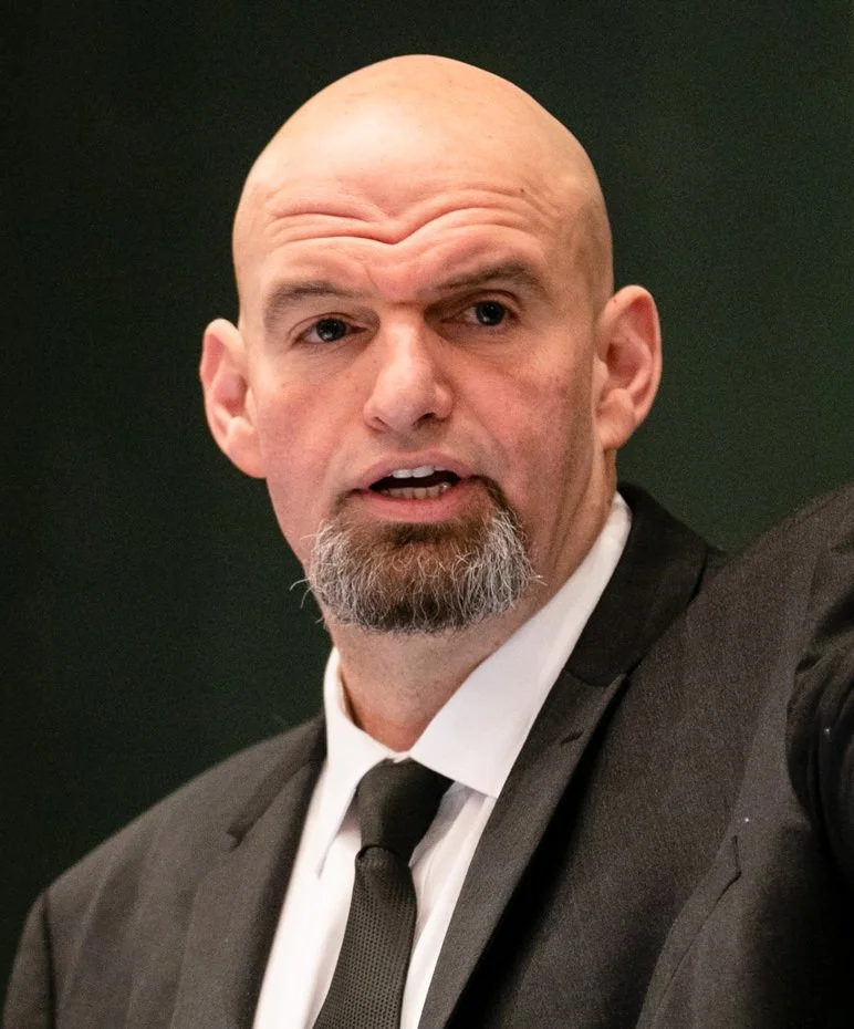 headshot of John Fetterman, Pennsylvania's senior US senator, in a suit and tie.