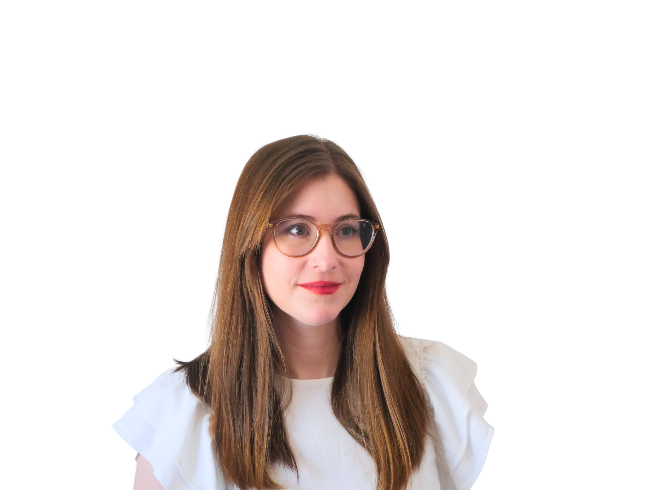 A young woman with long brown hair, wearing glasses and a white top, looking to her right with a slight smile.