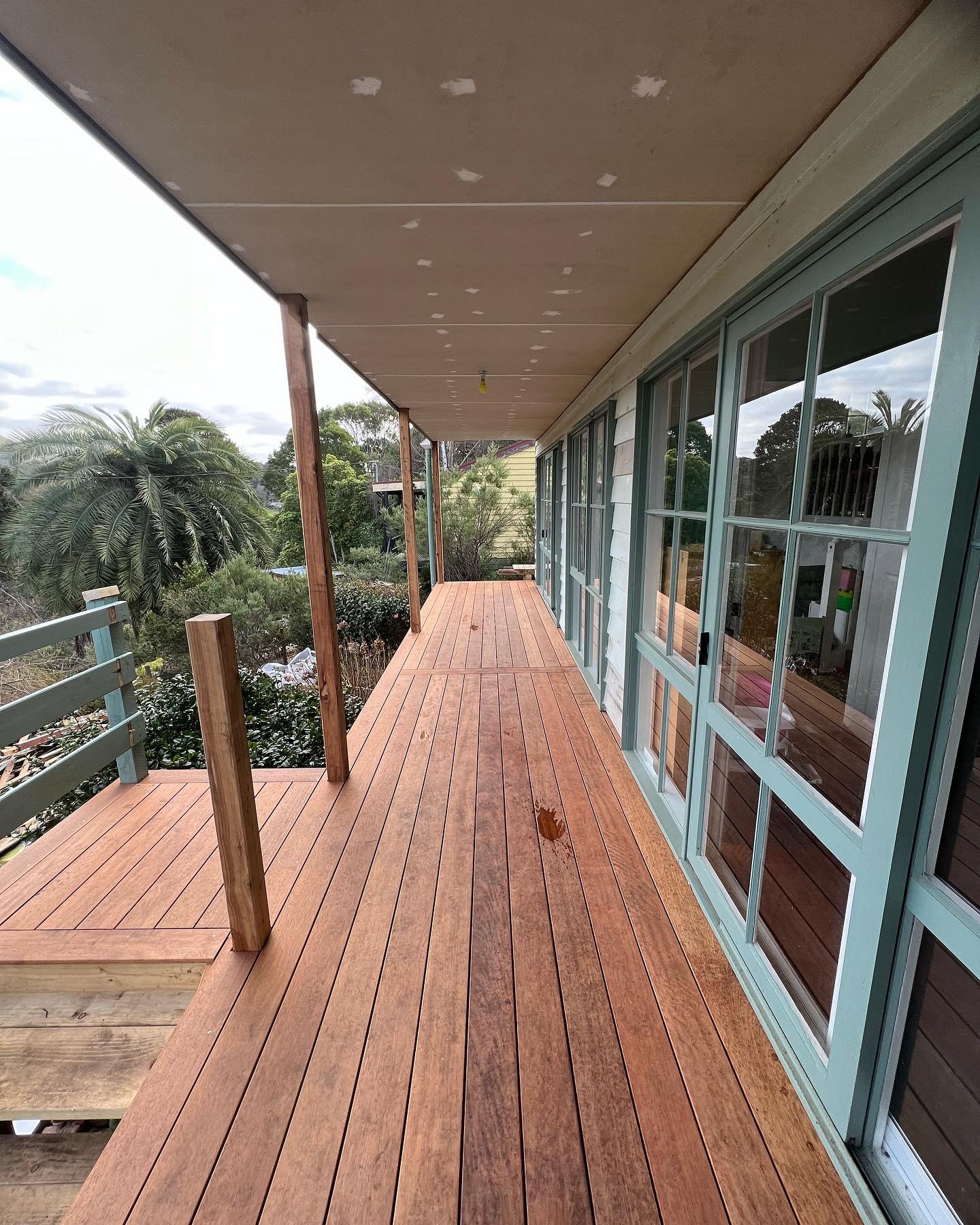 "✨✨ This gorgeous hardwood brings warmth and elegance to any outdoor space, and we couldn't be happier with the results.🌴🏡 Tag someone who would love to relax and unwind in this beautiful space! #DeckingRemodel #MerbauMagic #OutdoorLiving&quot