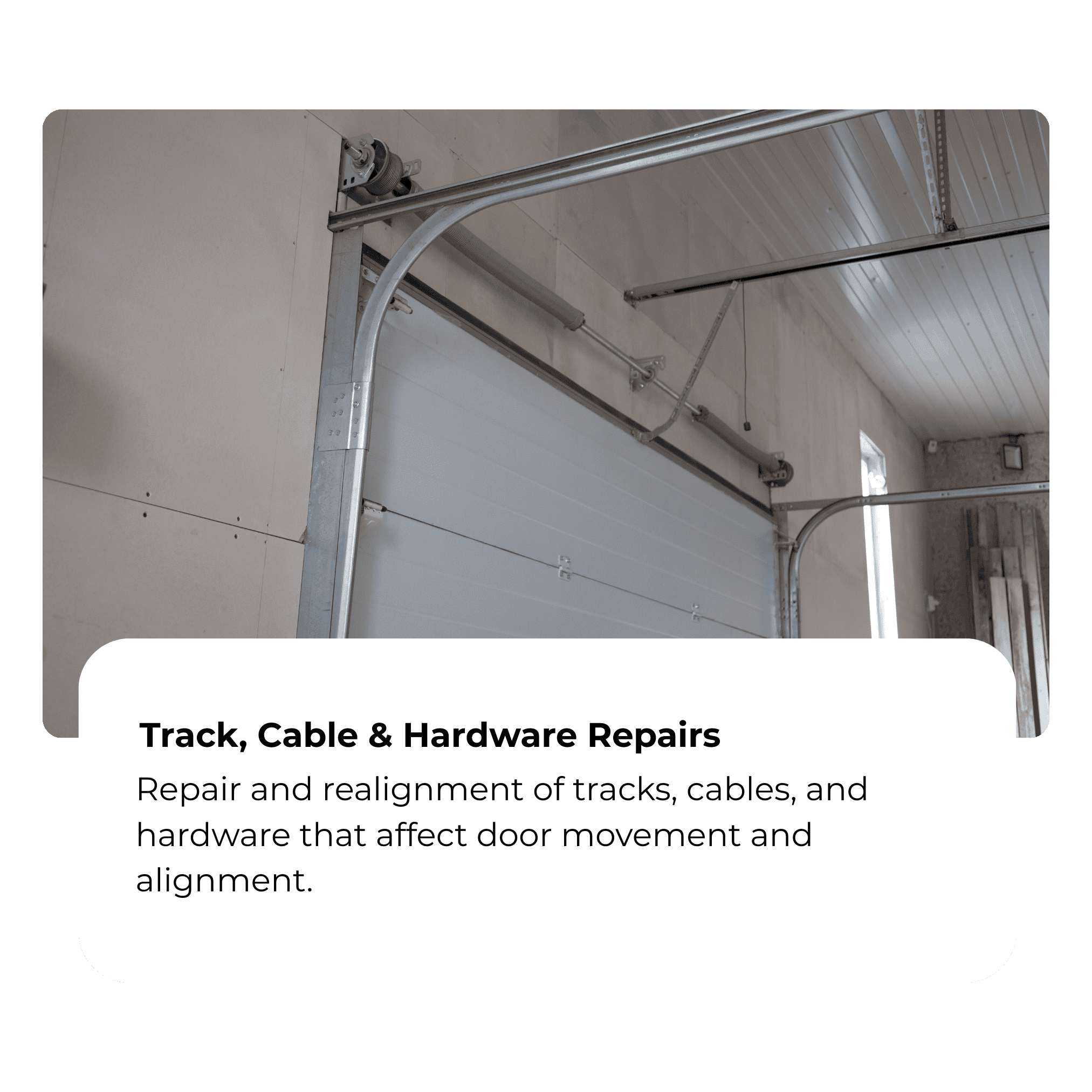 Garage door with track, cables, and hardware for repair and alignment.