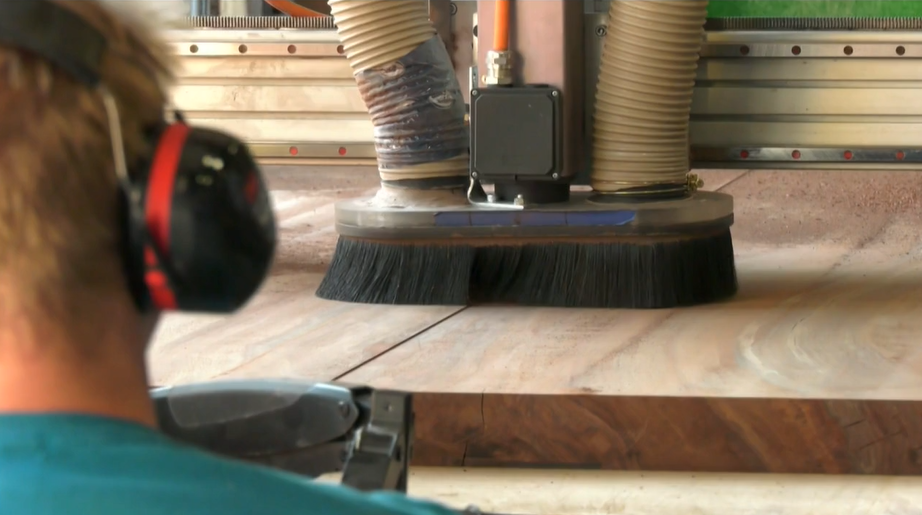 Calgary woodworking company delivers table to KISS frontman