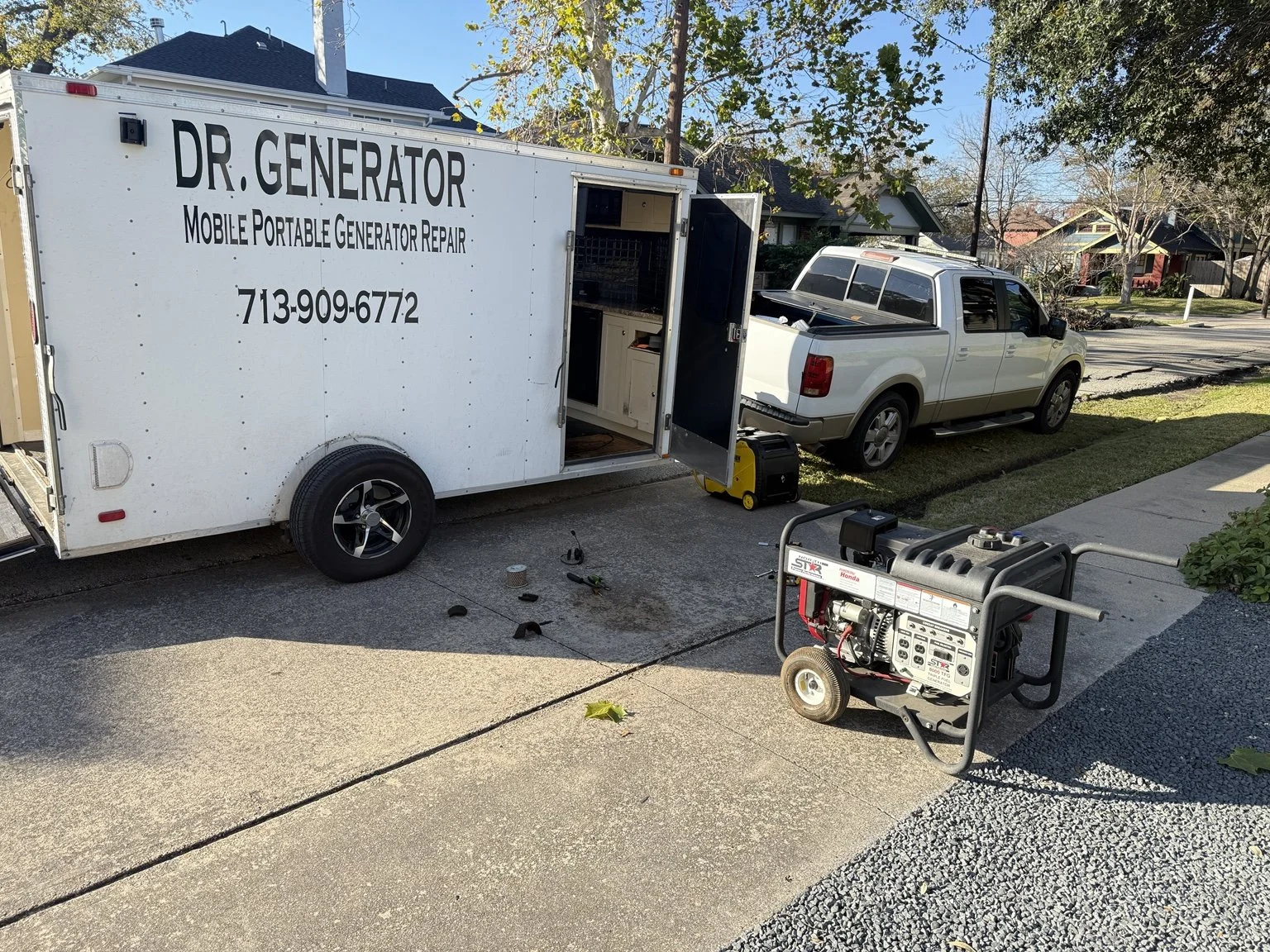 Dr. Generator mobile service trailer and portable generator during an on-site repair in Houston