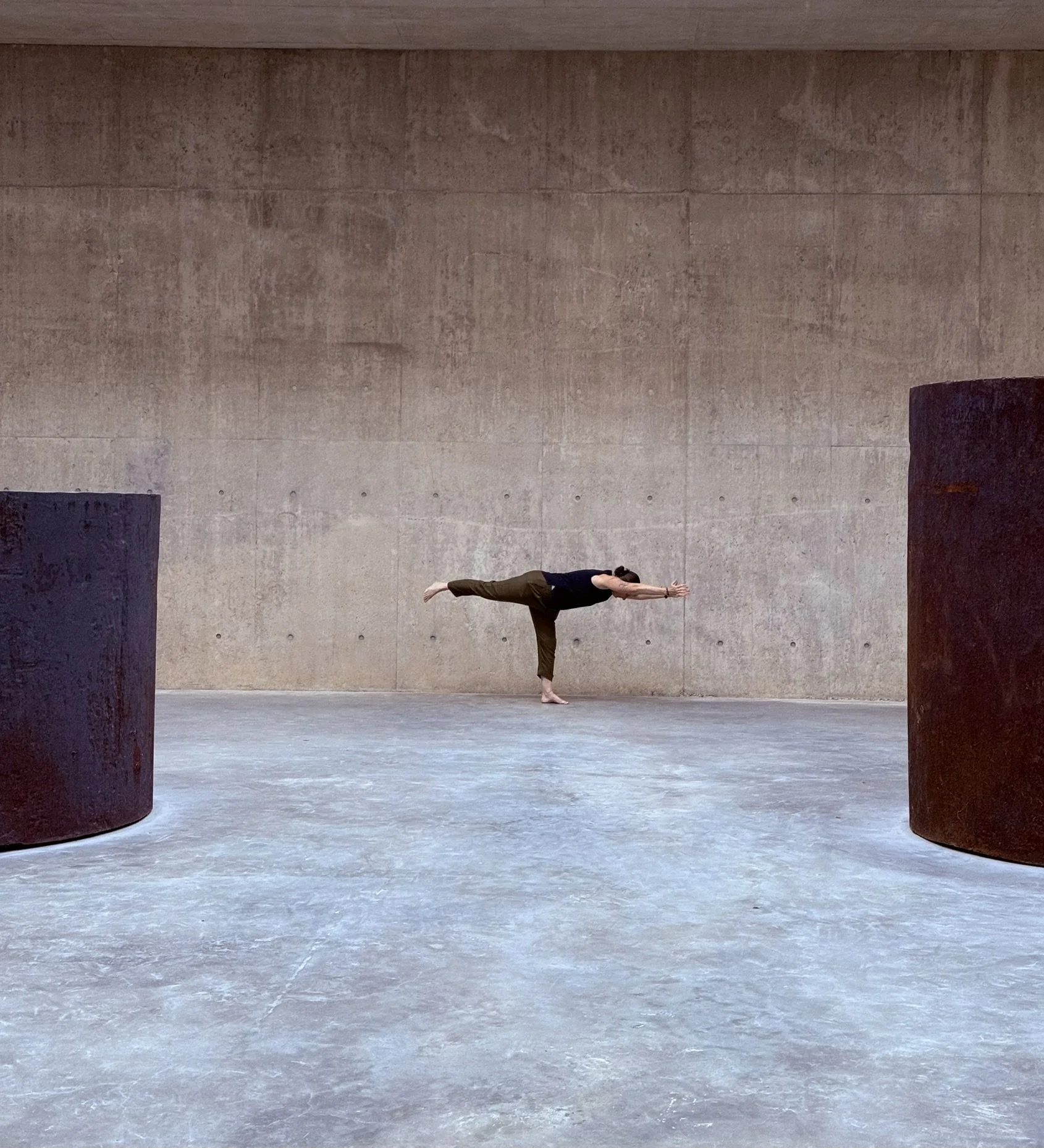 carrie in full warrior III pose at glenstone museum
