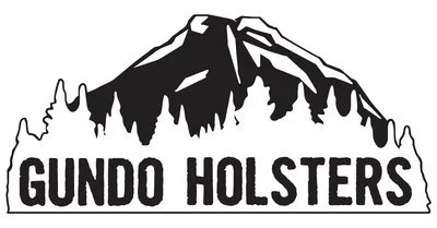 A mountain with trees at the base and the words 'Gundo Holsters' below it.