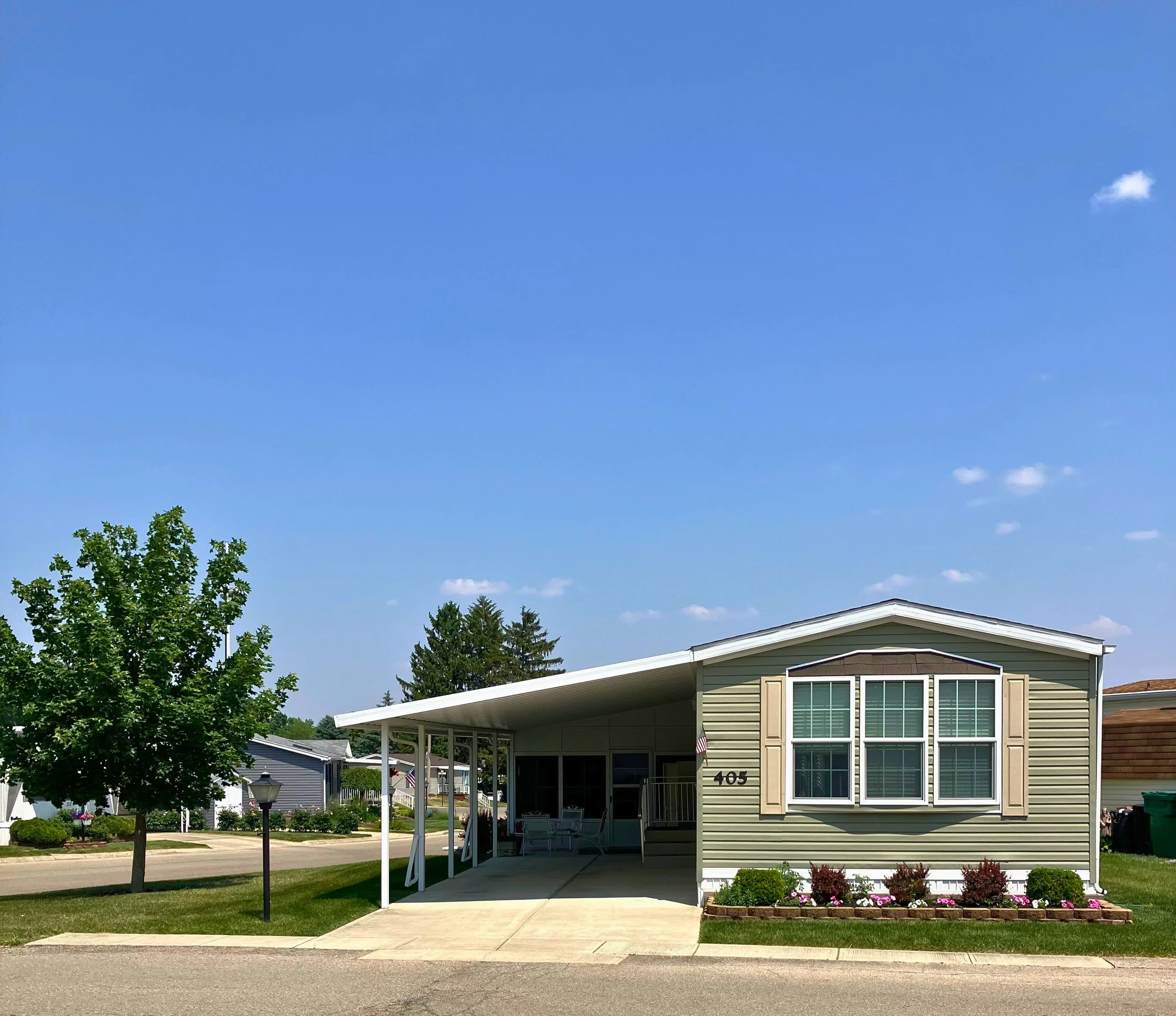 manufactured home in Red Oak 55 and over community with covered carport